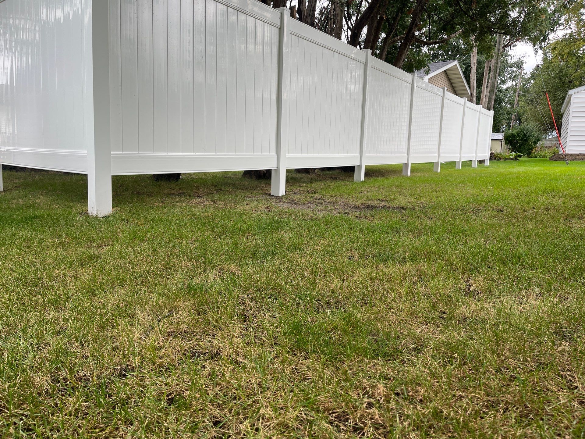 Residential White Vinyl Privacy Fence Enclosure in Waterloo by Perfect Picket Fence and Stain