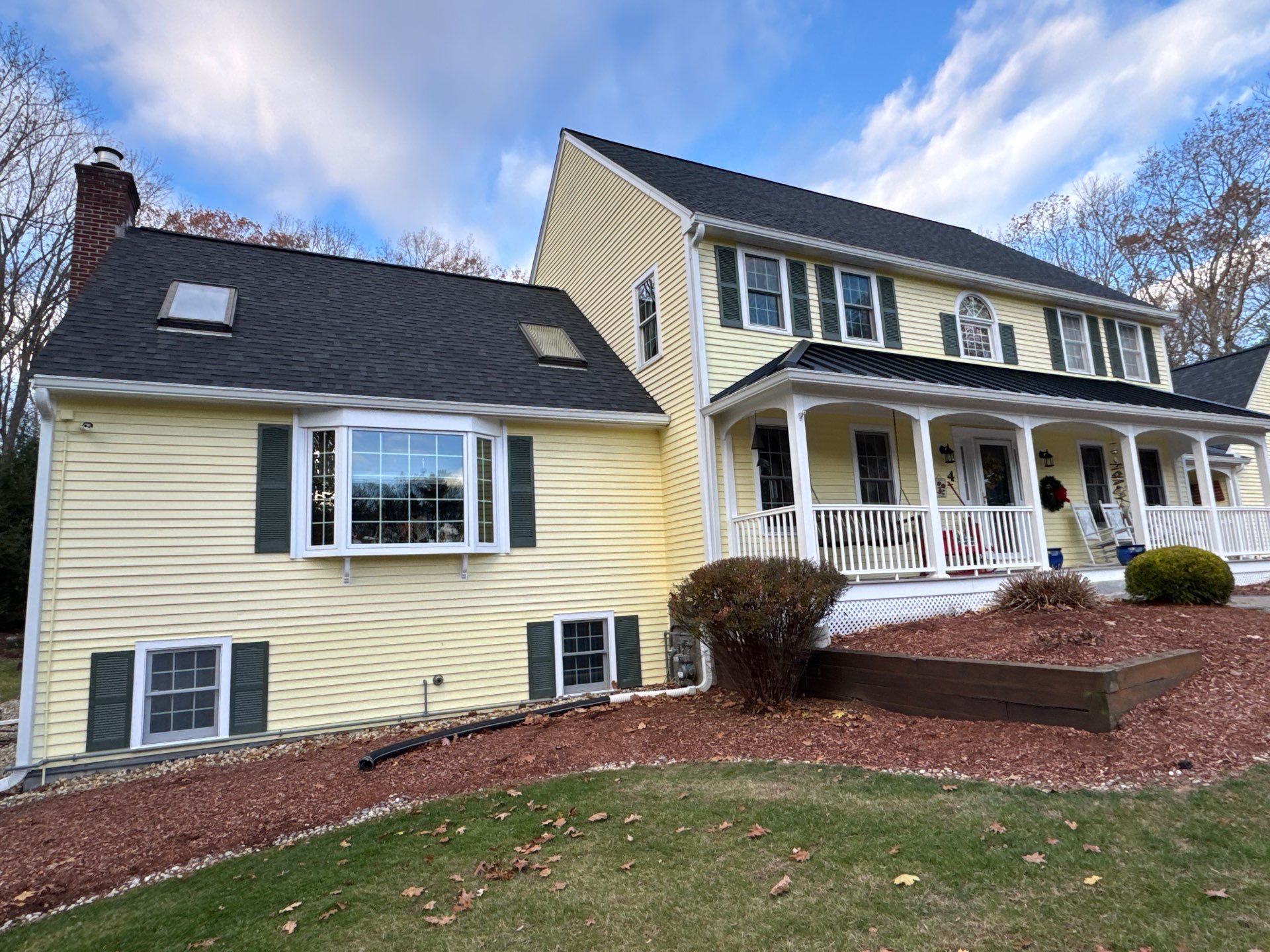 Chelmsford Premium Roof: Onyx Black Shingles with Standing Seam Metal Porch by Mighty Dog Roofing of Greater Middlesex County