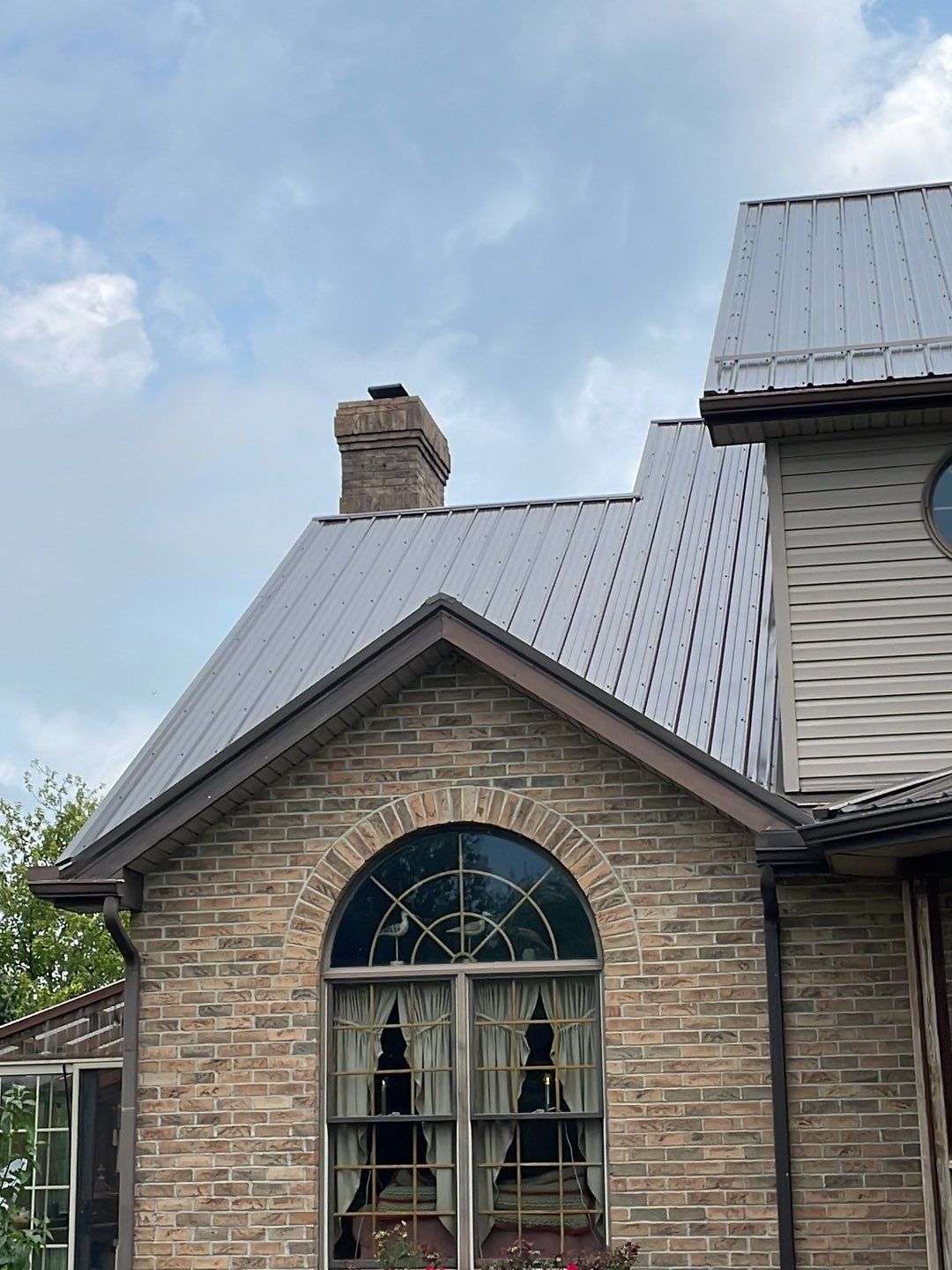 Residential Roofing Installation using Performance Panel Metal - Burnished Slate by RoofX 