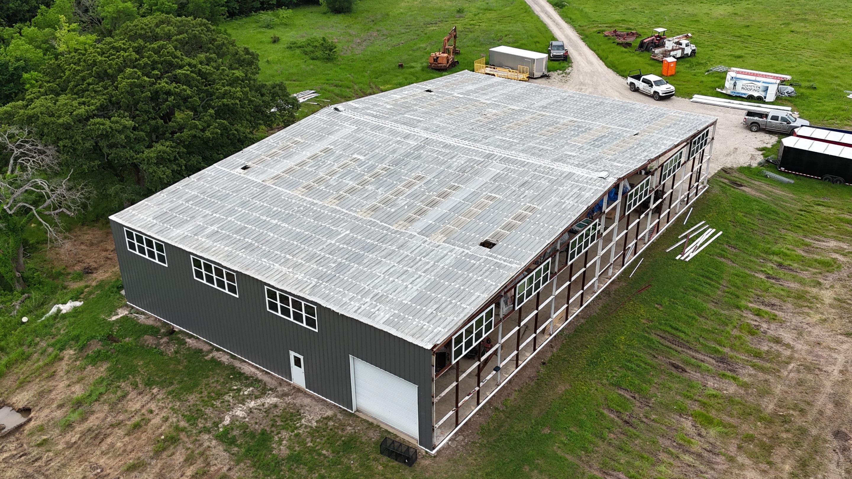Complete Restoration with Skylight/Window Install - Greenville, TX by Hostetler Roofing