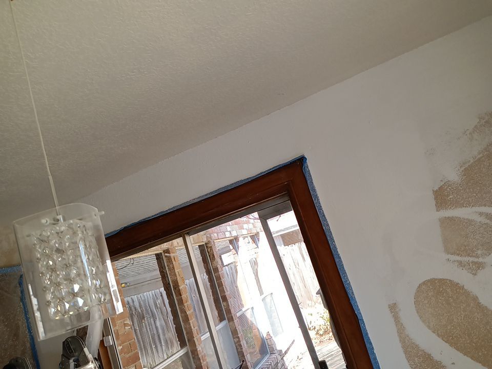 Interior and exterior painting project by Roof Concepts Construction
