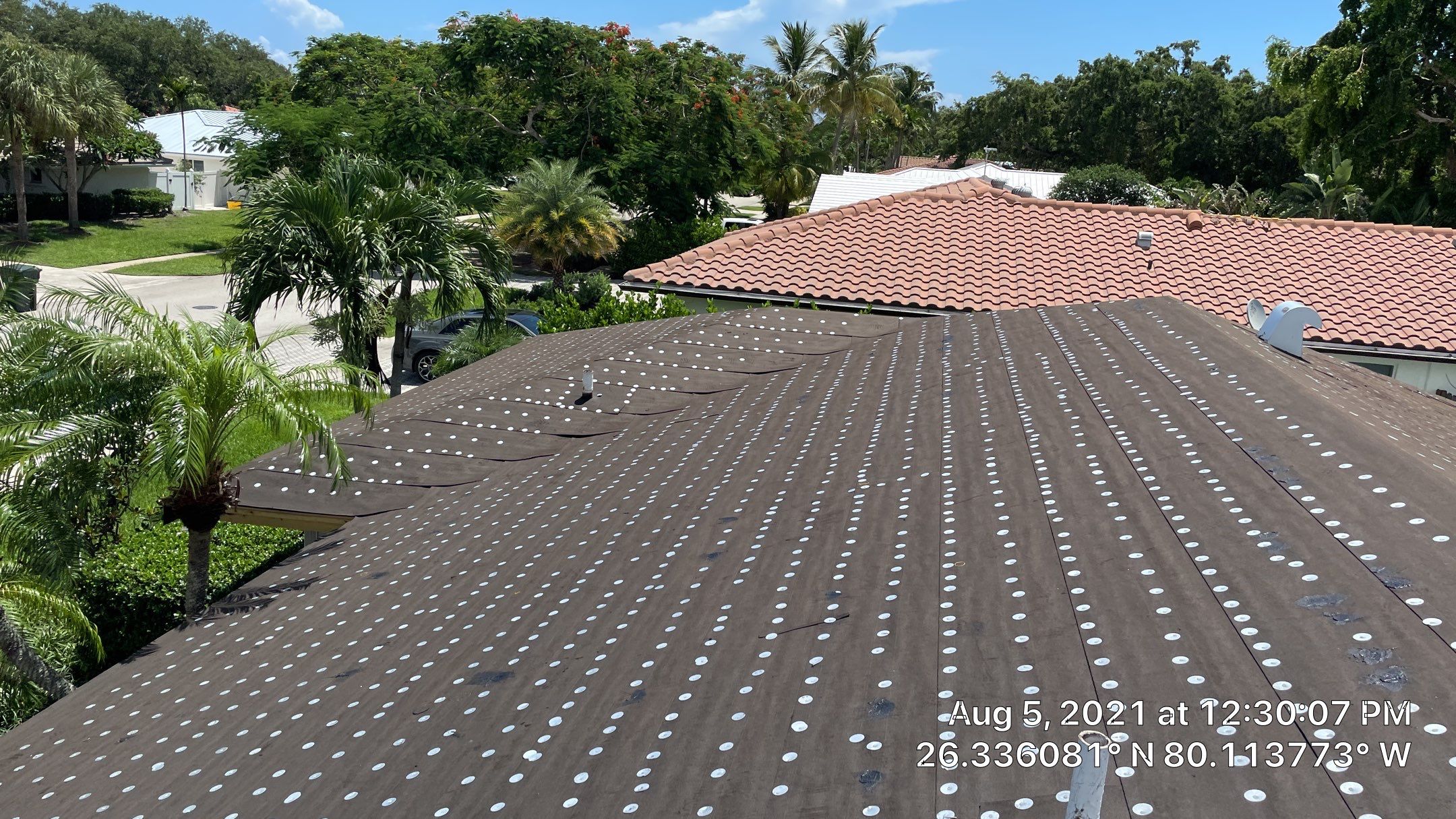 Residential Roofing Installation using 1" Nail strip metal roof by BLUES BROTHERS ROOFING