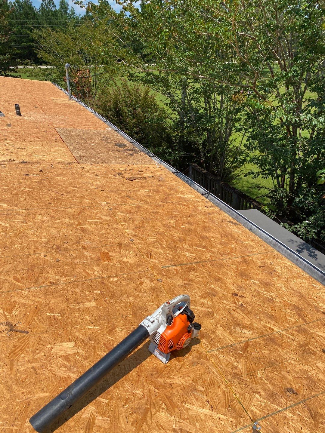 Commercial Roofing Installation using Roof Replacement by American Roofing & Construction LLC
