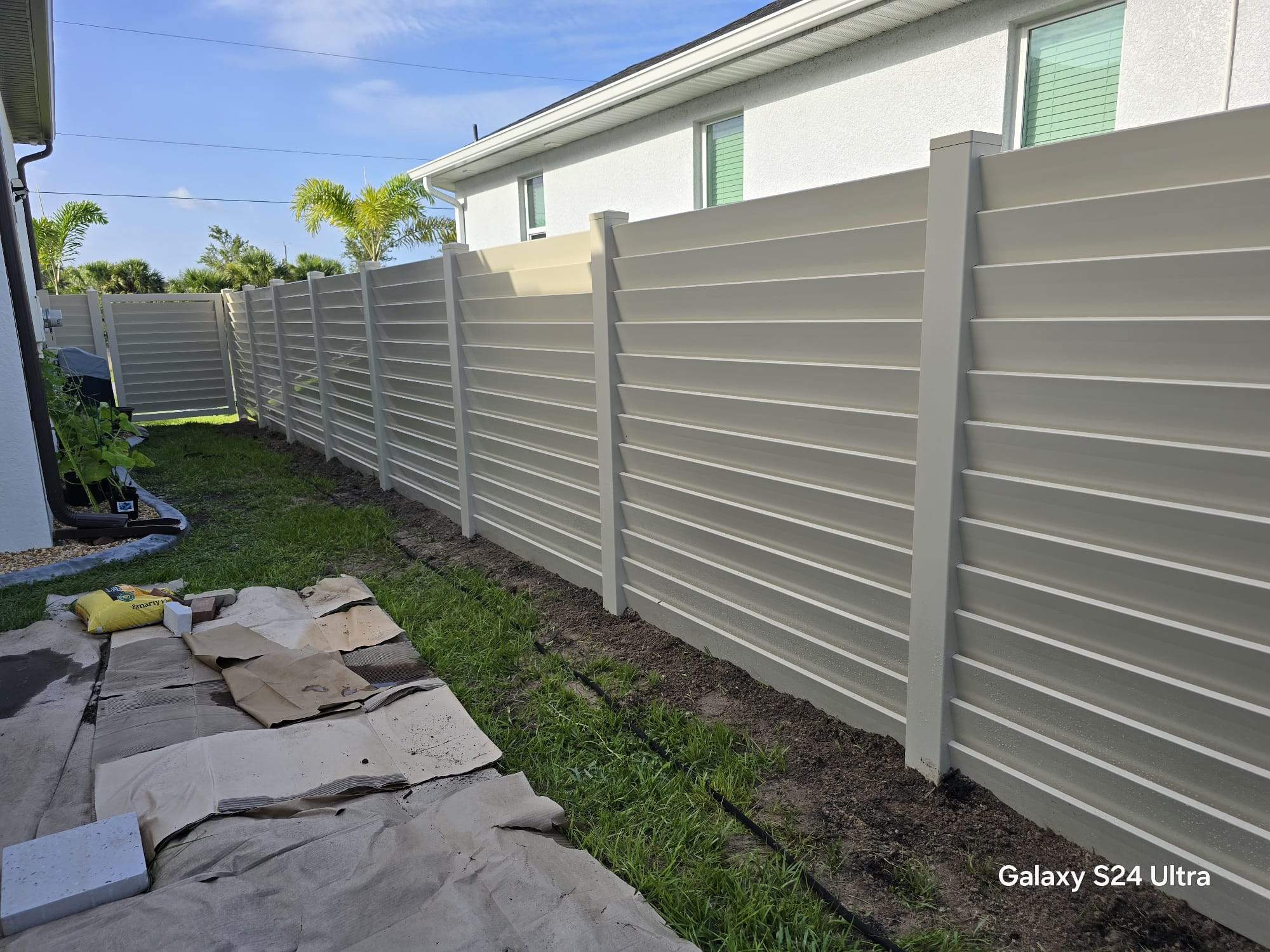 Tan Louvered Vinyl in Port Charlotte by True Fence LLC
