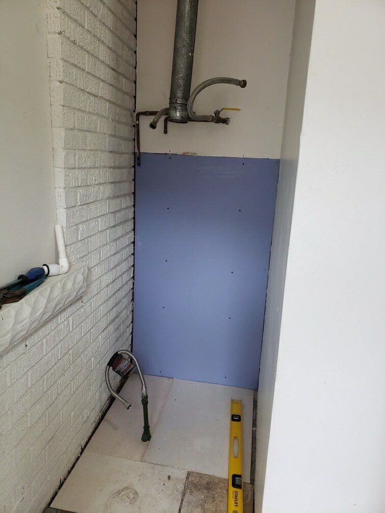 Bathroom Remodel using BCI Acrylic Shower System by Secure Construction Company Inc