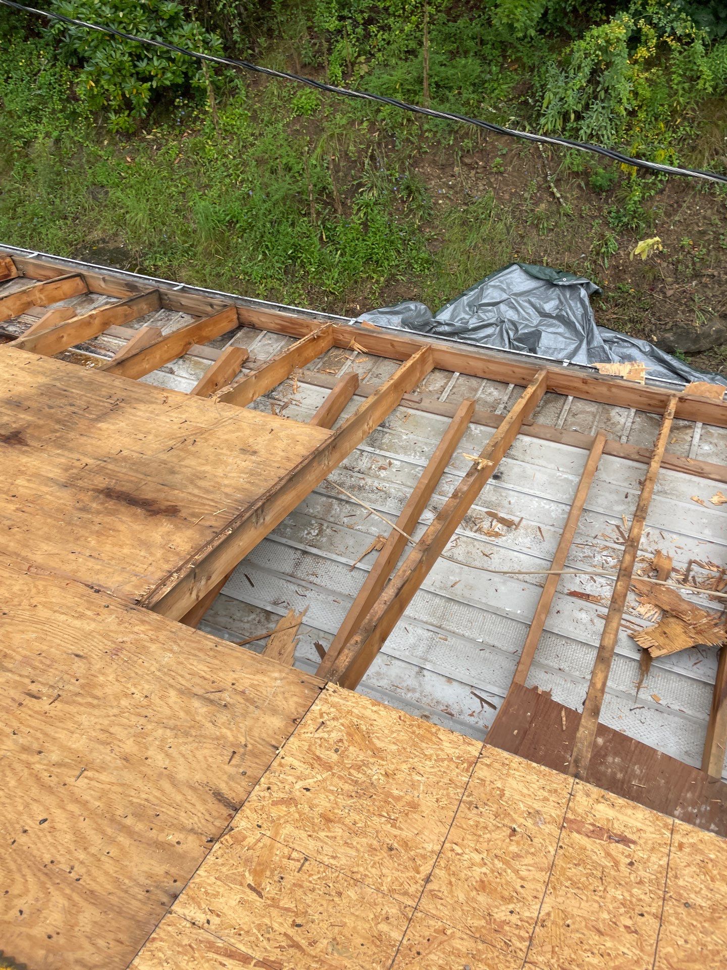 Residential Roofing Installation using GAF Timberline HDZ Charcoal by Rainstoppers Roofing