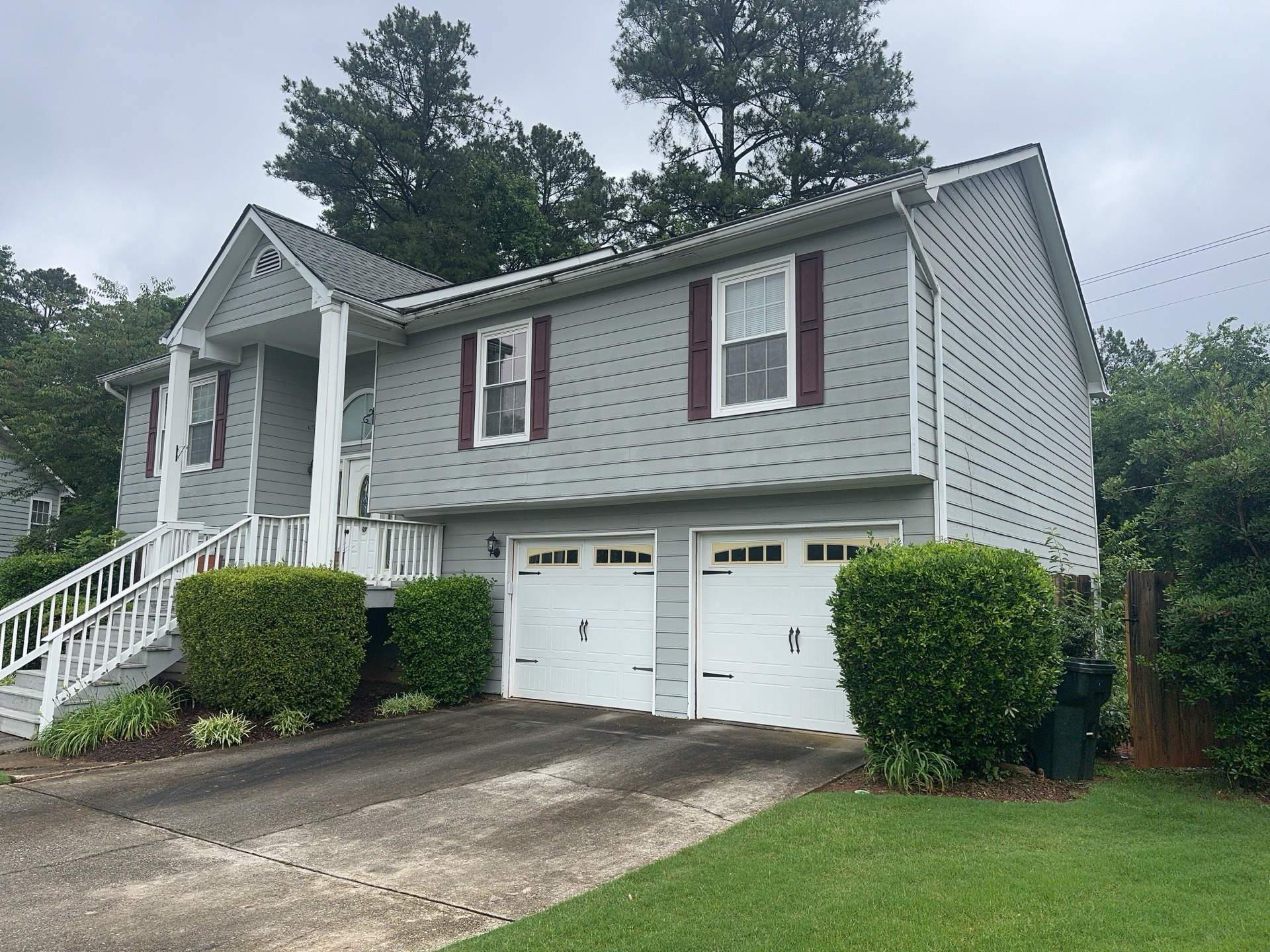 Alpharetta, GA Partial Siding Replacement, Porch Stain, and Exterior Painting by Nelson Exteriors 