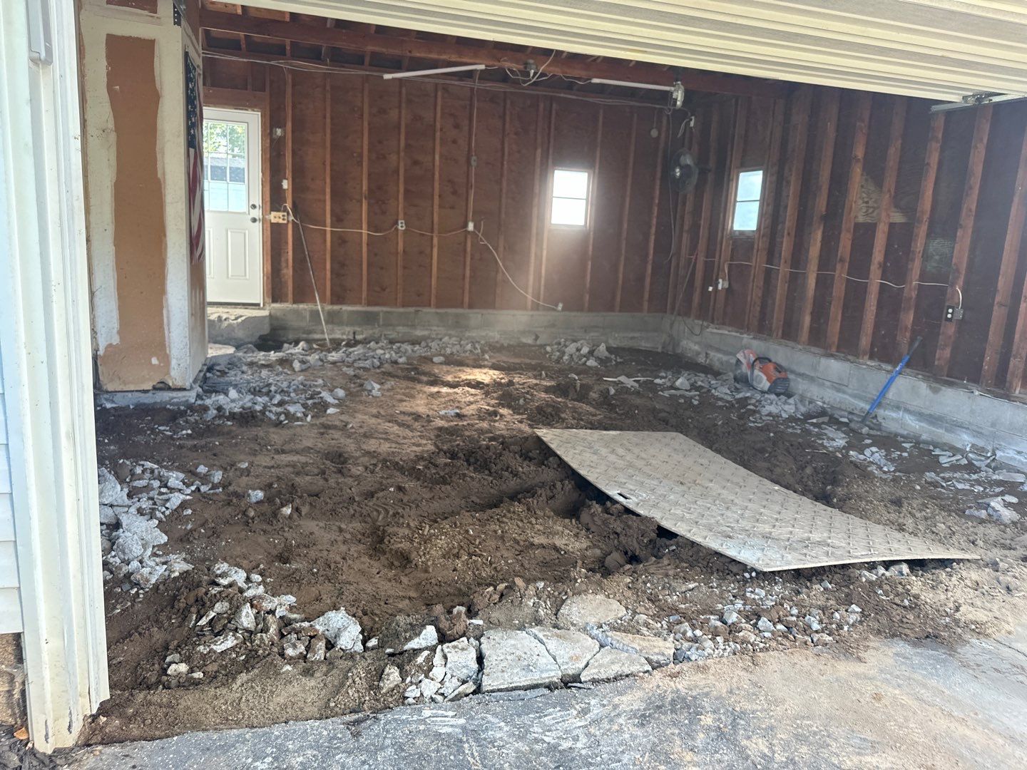 Concrete garage floor replacement  by NG Masonry & Construction LLC