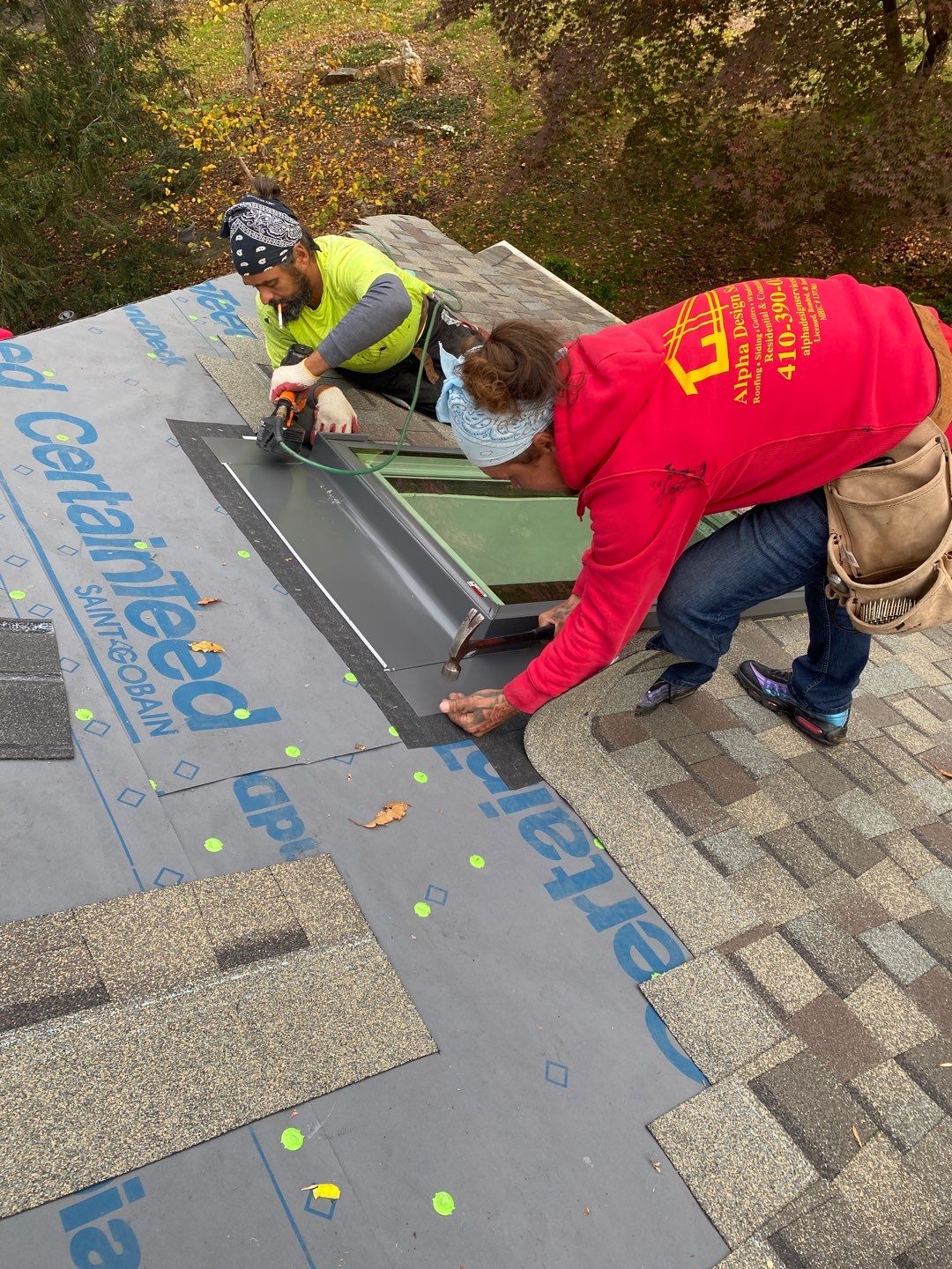 Install new shingles and new skylights  by Alpha Design Services