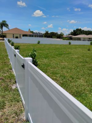 White Vinyl Privacy Fence Installation on Port Charlotte Corner Lot