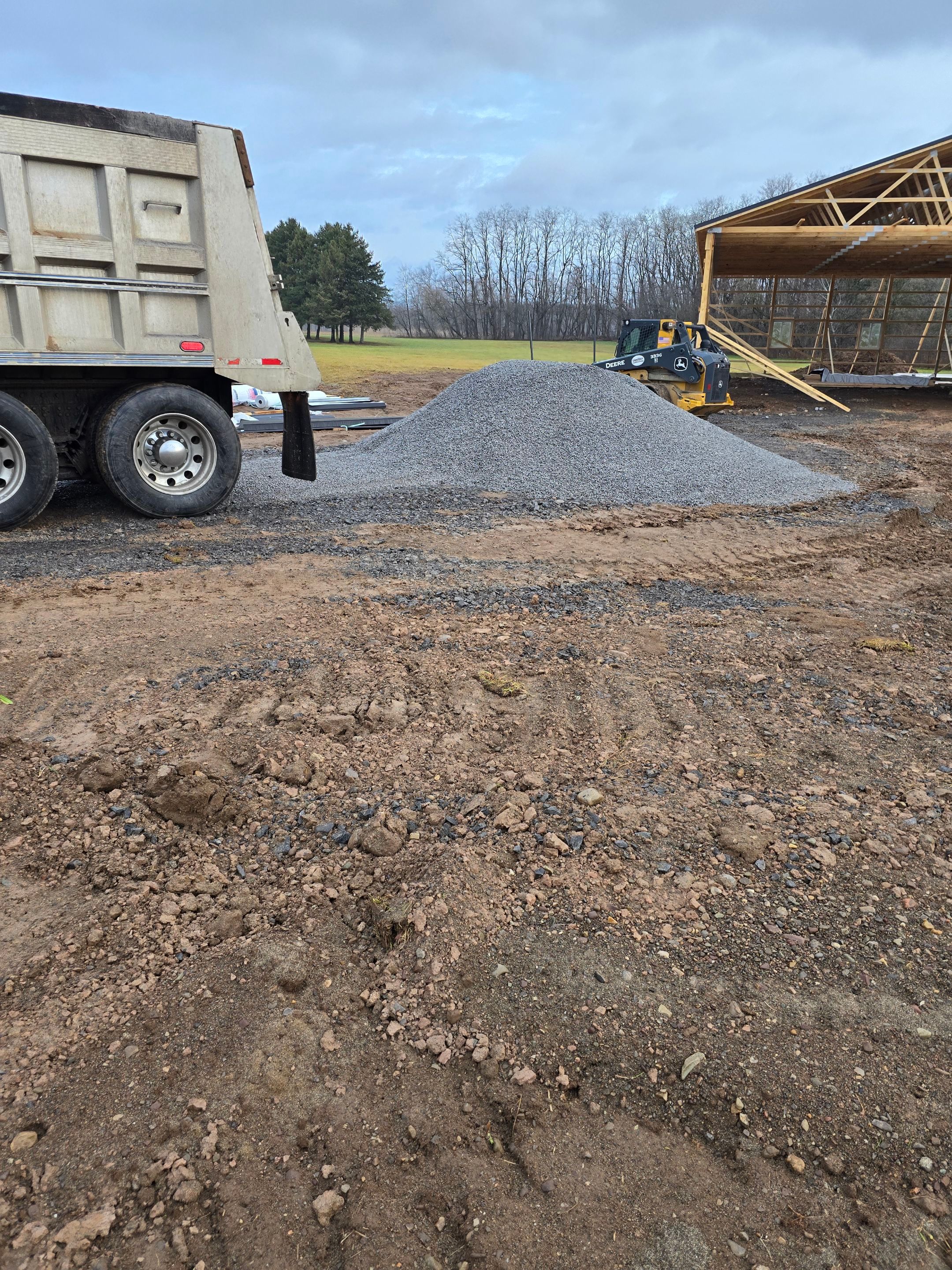 Barndominium  using Textured Board & Batton by Horst Custom Homes 