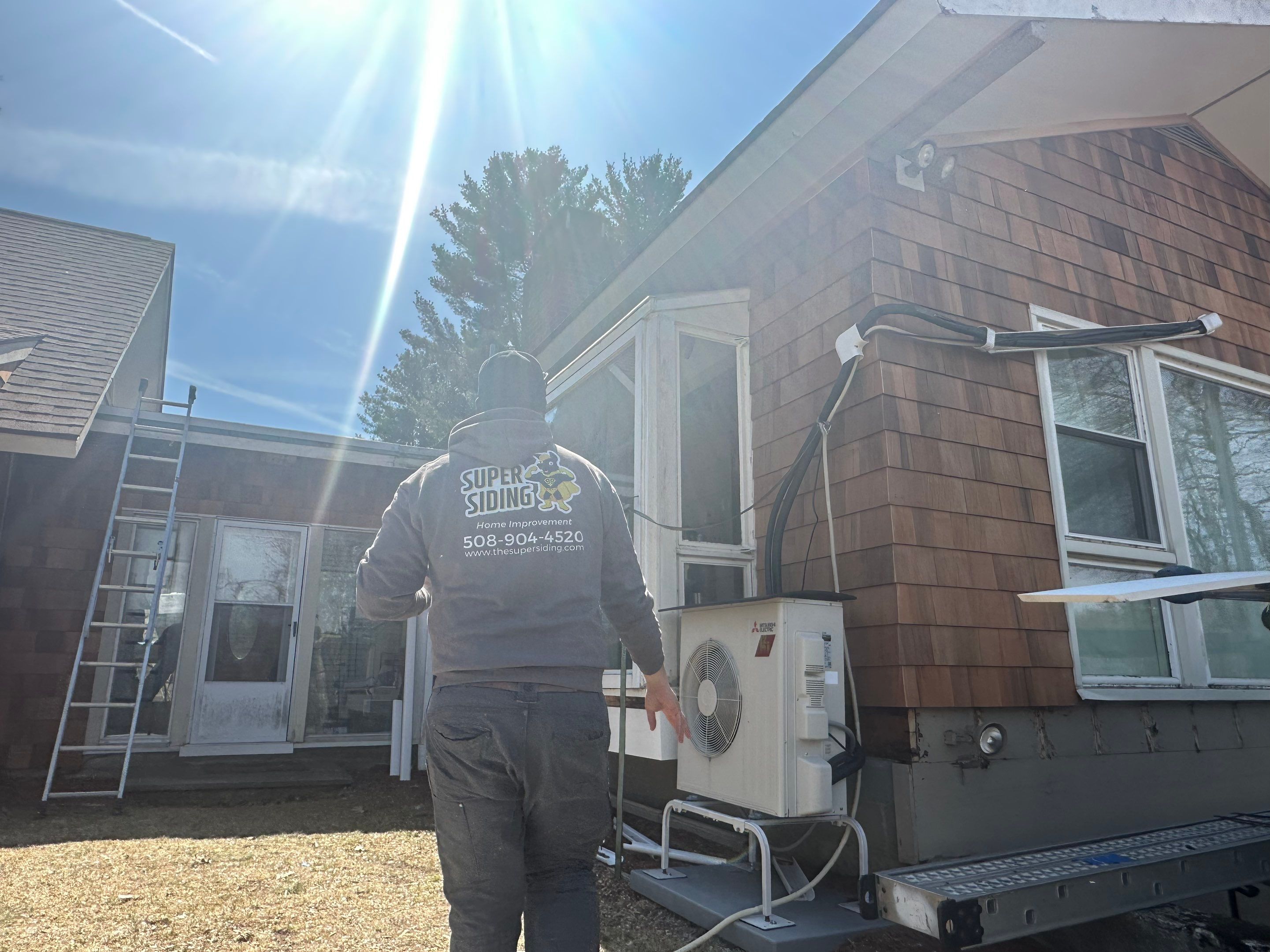 Siding Installation using Perfection Red Western Cedar Shingles  by Loyalty Exterior Solutions 