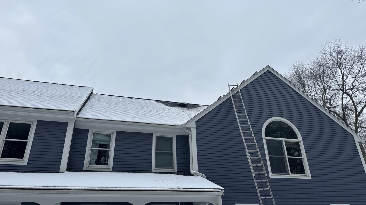 Solar-Ready Roof Replacement with GAF Pewter Gray Shingles & VELUX Skylights by Sensible Home Solutions