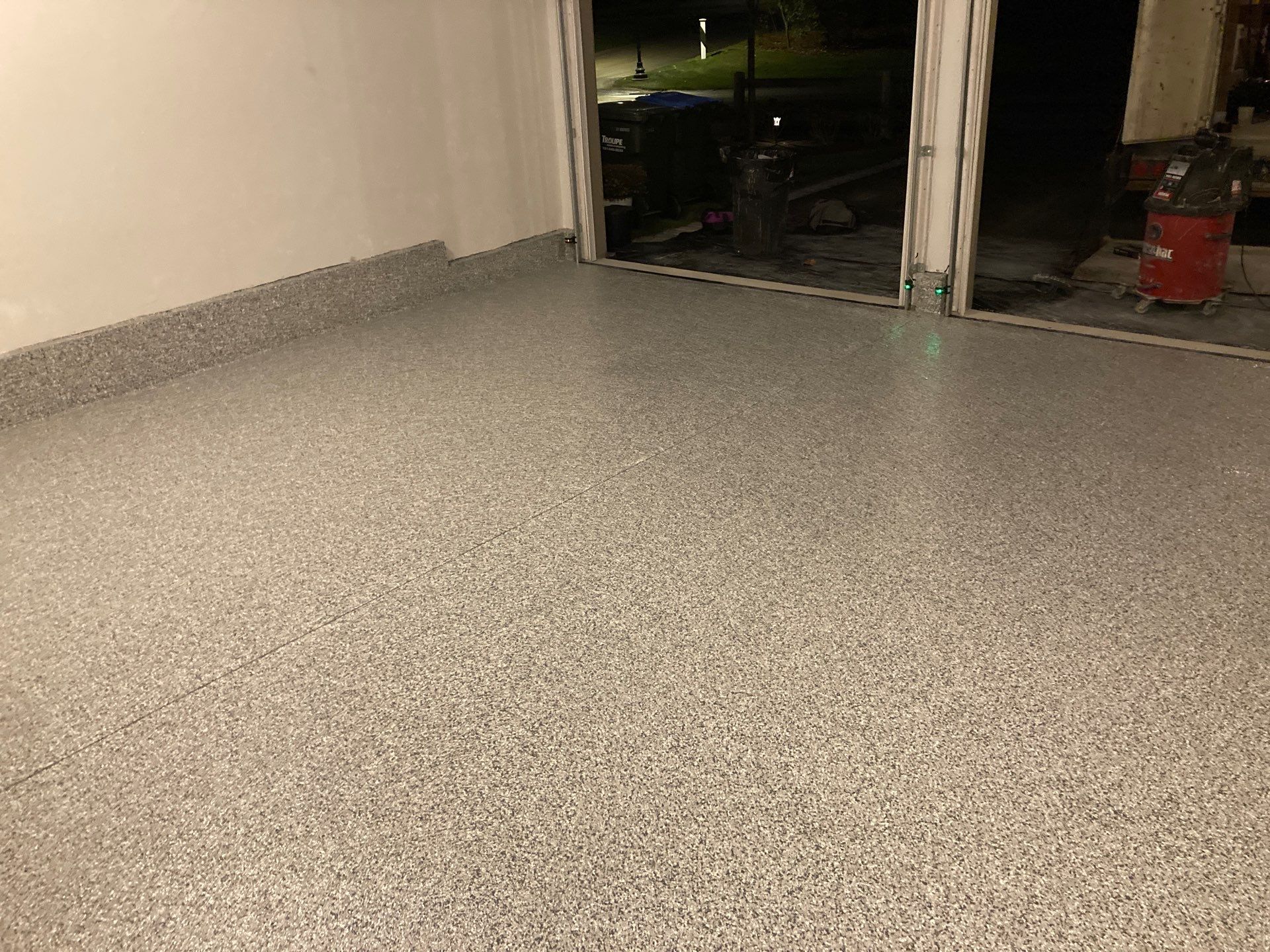 Cuddy Garage TransFLOORmation by Symphony Concrete Coatings