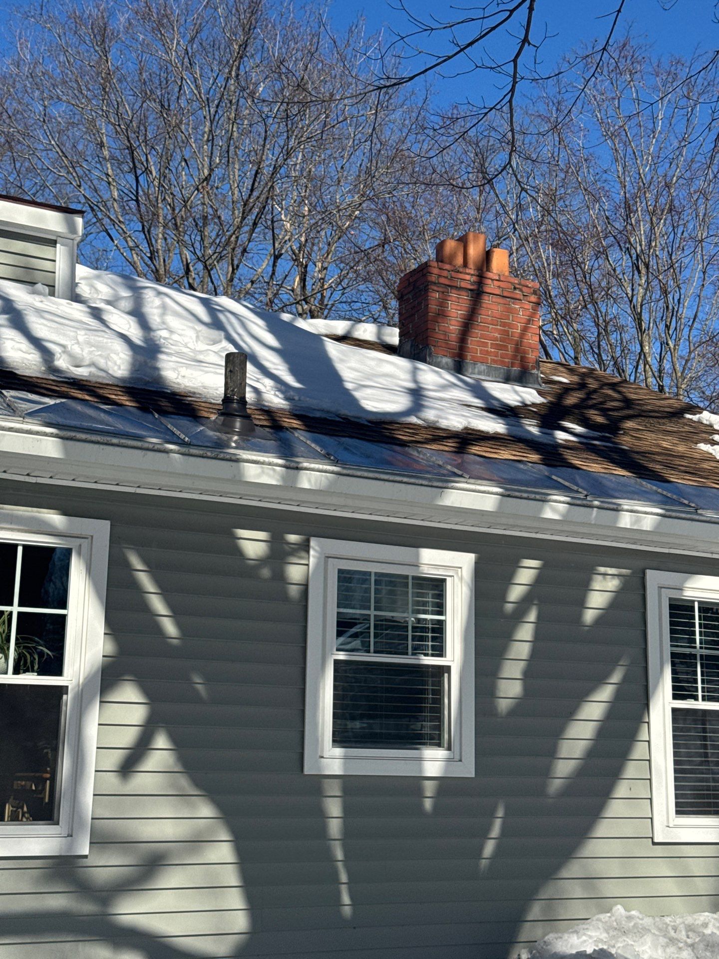 Snow/Ice Belt & Ice Dam Removal Project in Woburn by Mighty Dog Roofing of Greater Middlesex County