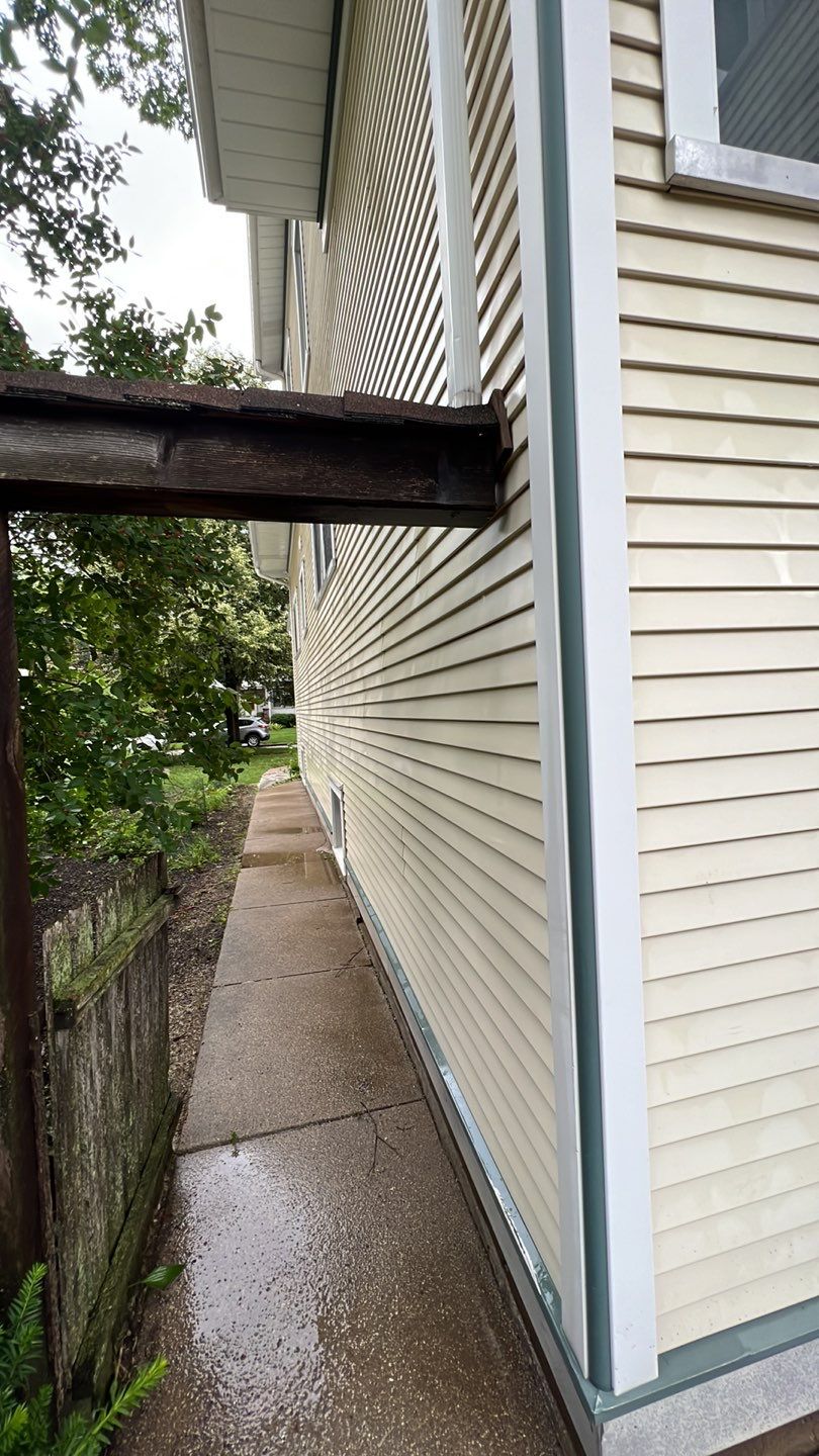 Housewashing  using Algaecide, soft wash soap by Northern Power Washing LLC.
