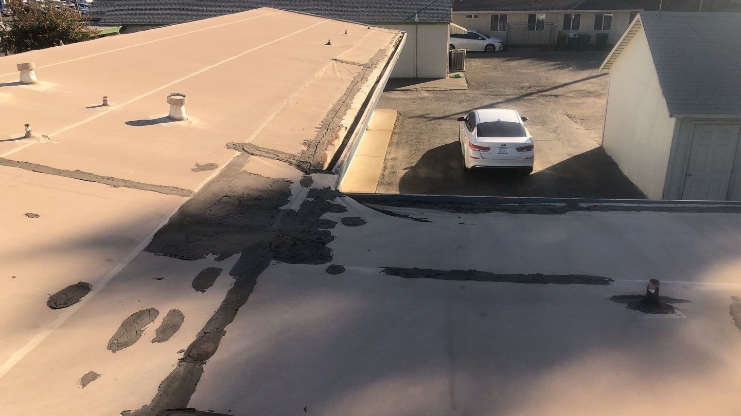 Spray foam and coatings using Conklin Benchmark/PUMA XL coatings and spray foam by Straight Edge Roofing Inc