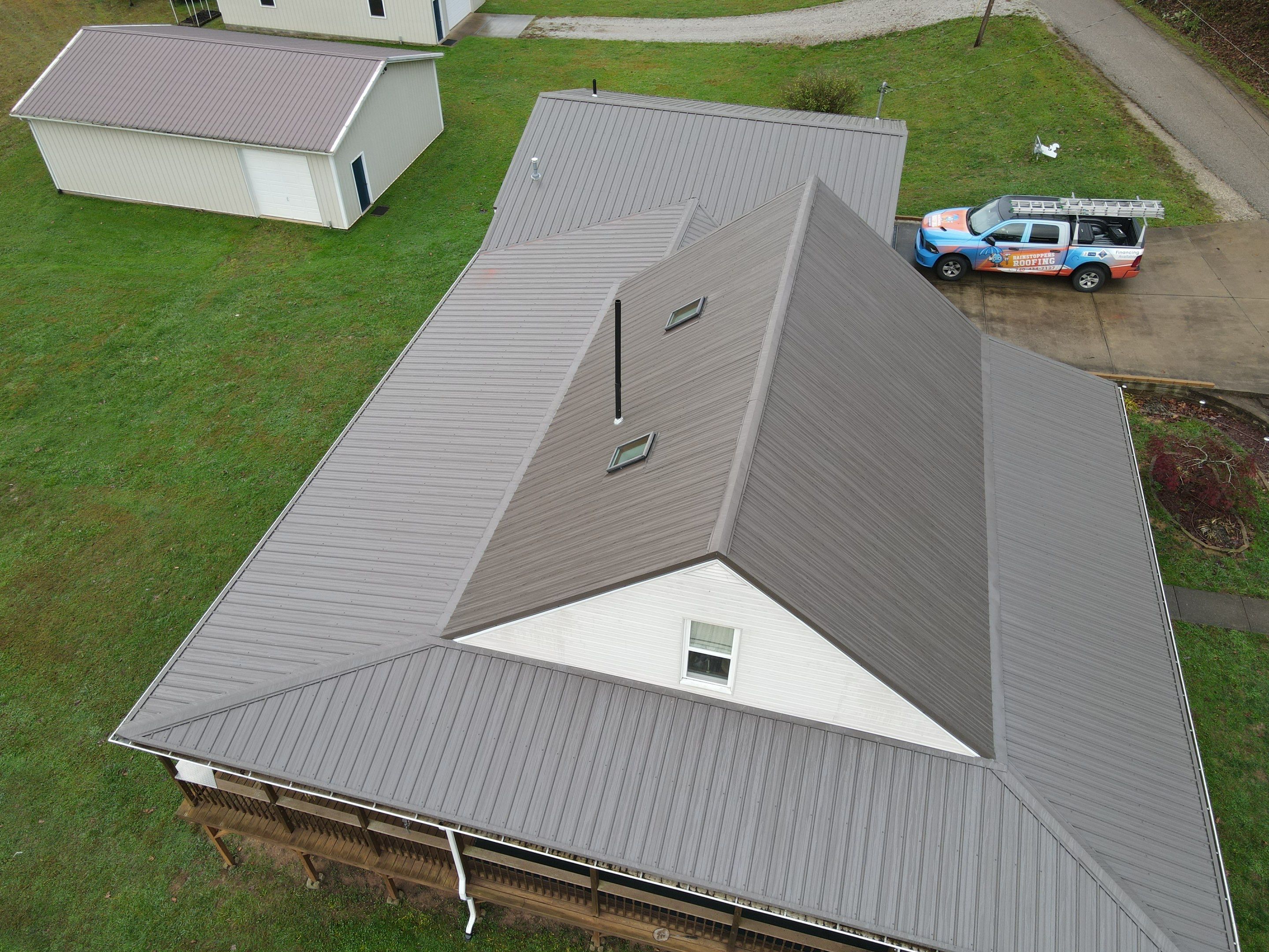 Residential Roofing Installation using Metal by Rainstoppers Roofing