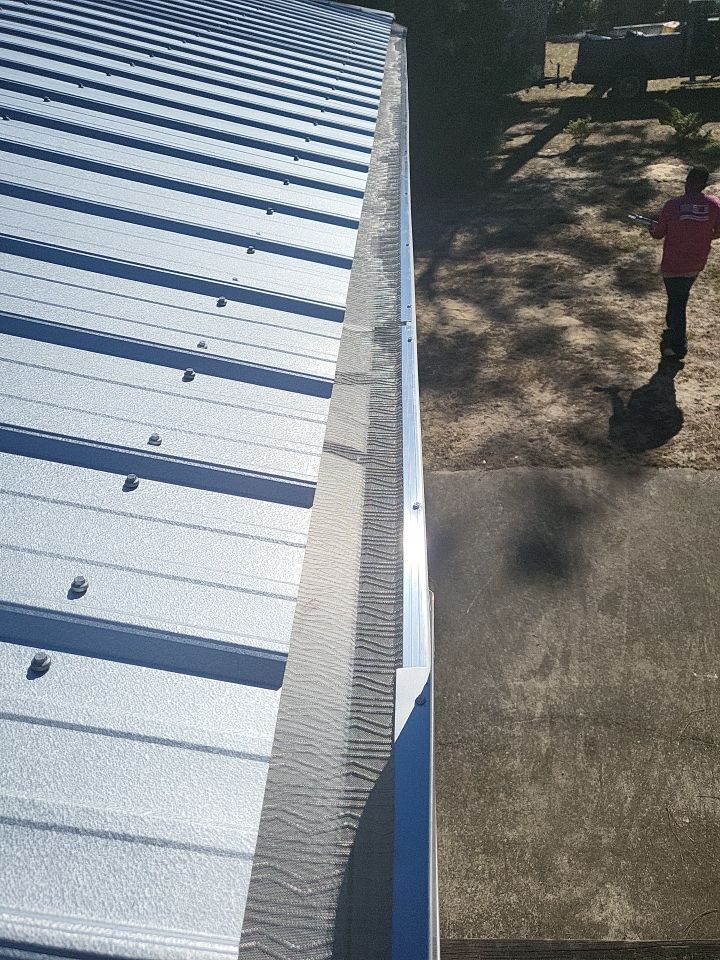 Gutter Installation using K-Style Seamless Gutters and LeafBlaster Pro Gutter Guards by Gutter Professors
