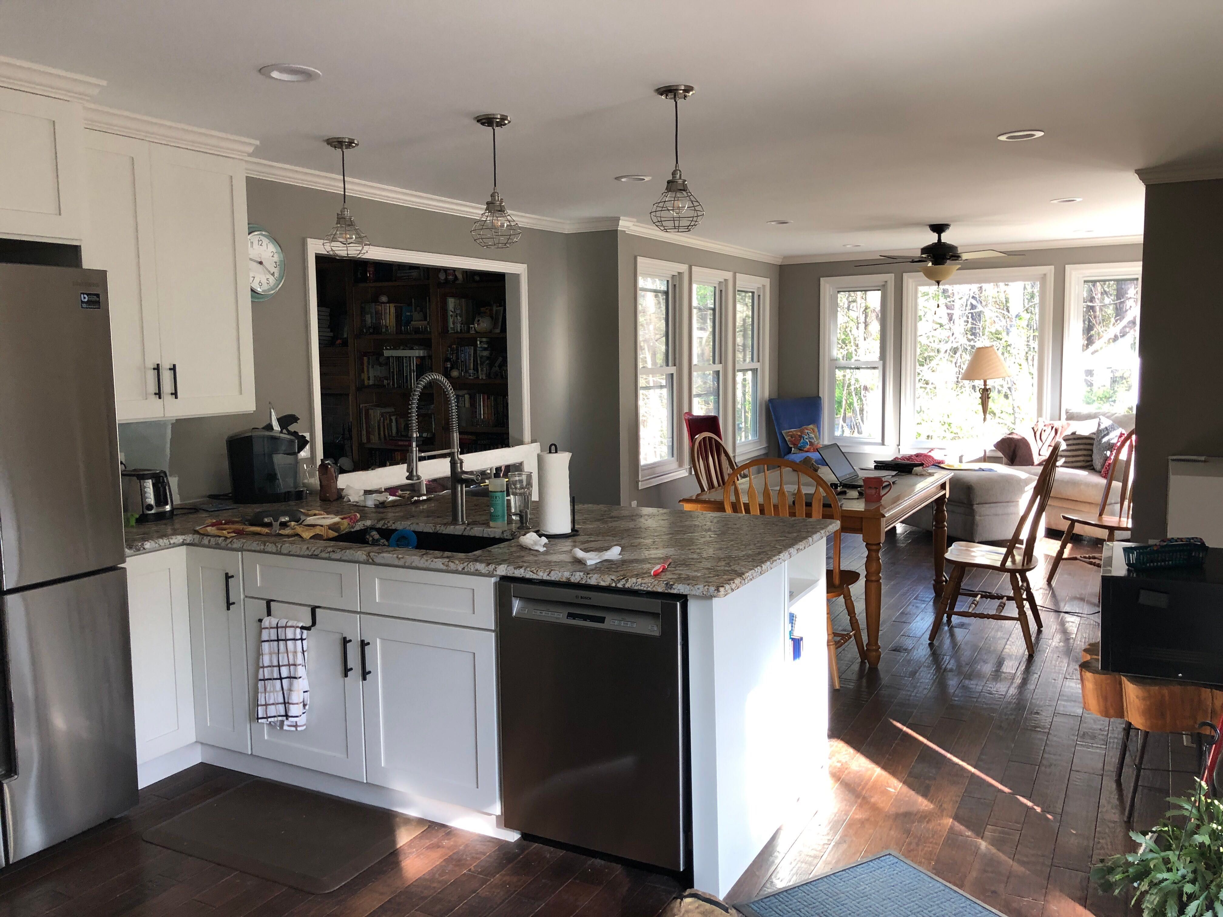 Open Concept Kitchen Remodel With White Shaker Cabinets in Kennesaw by Swift Home Renovations