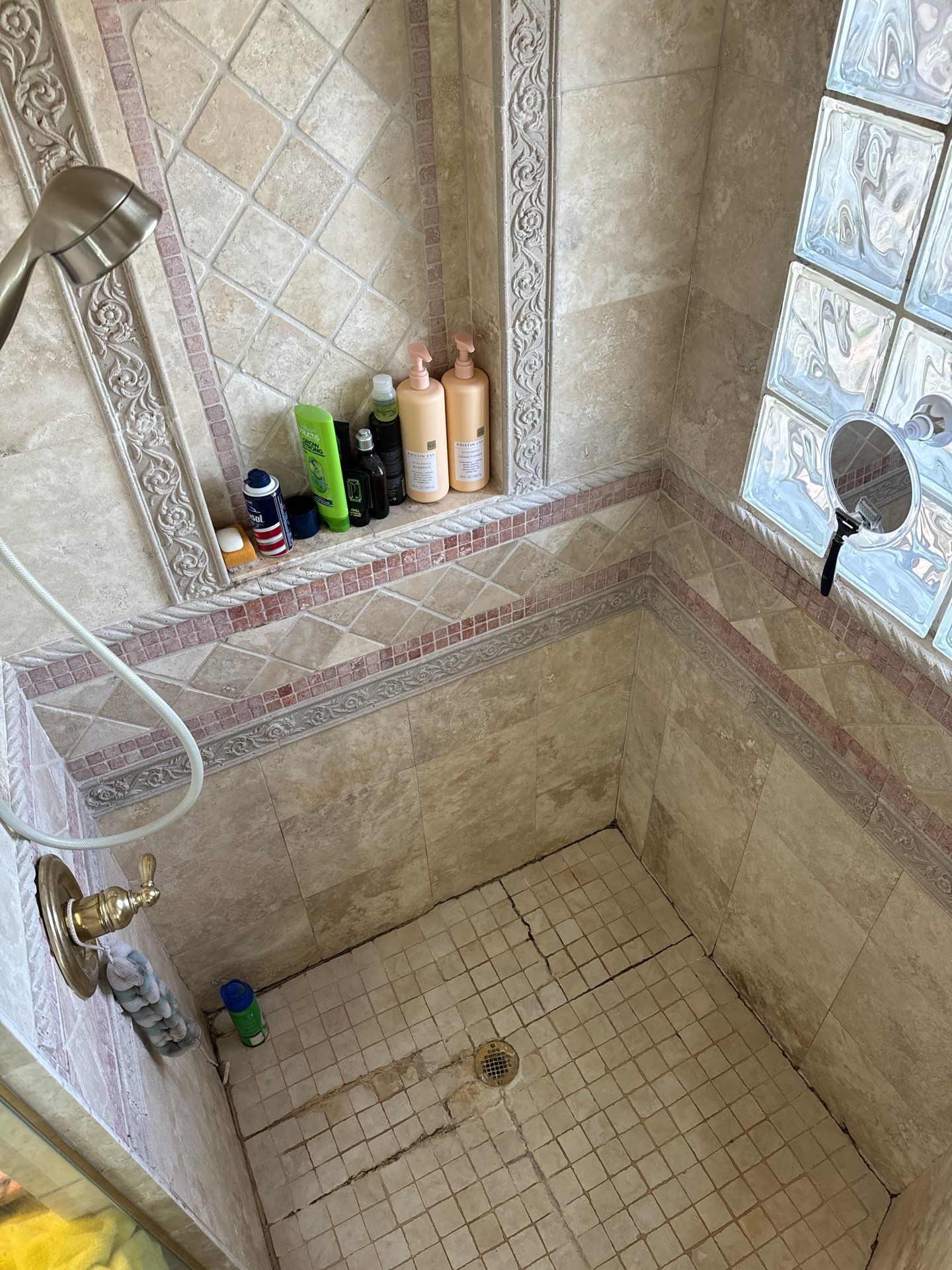 Shower floor repair by Prudencio