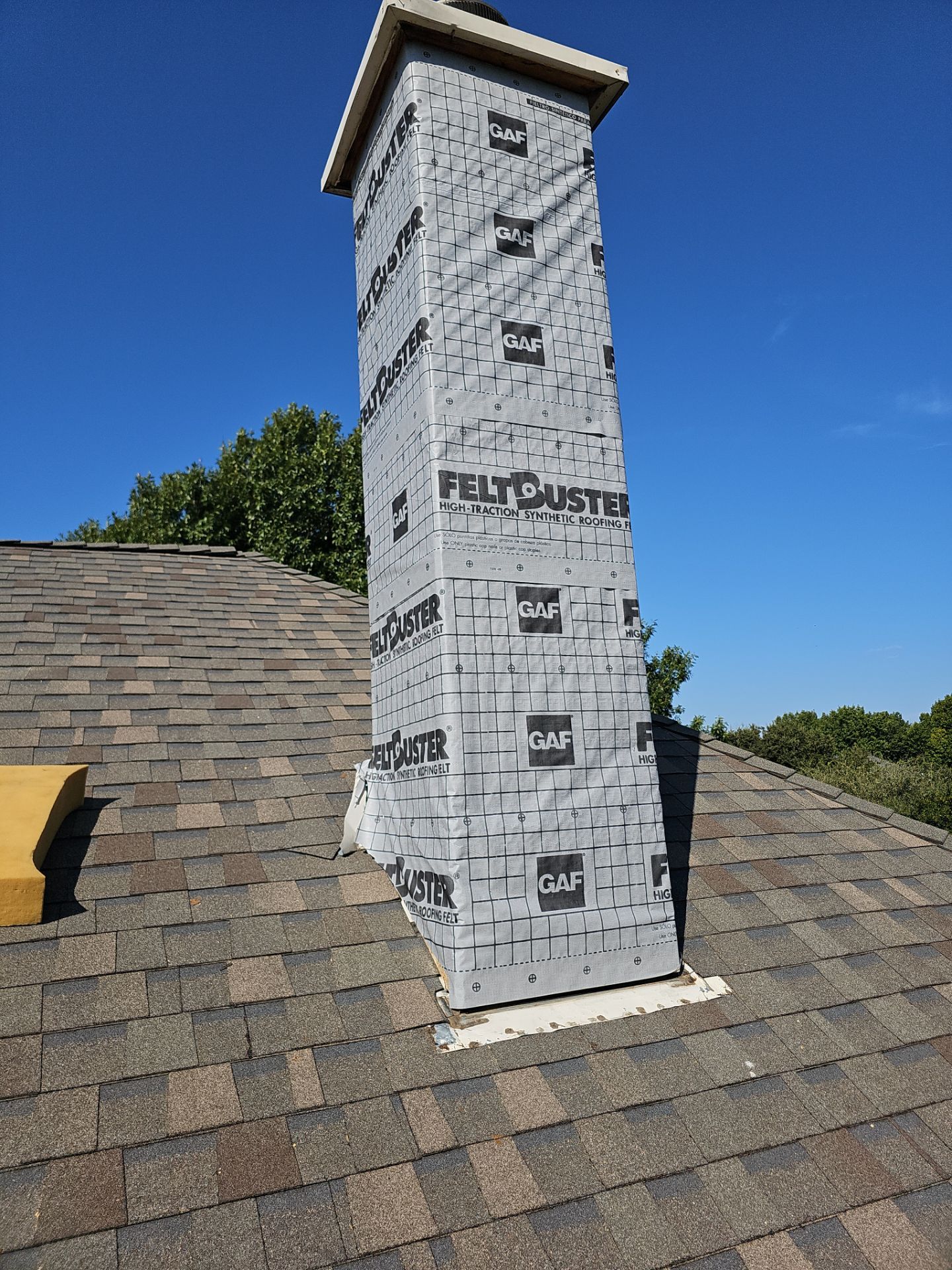 chimney repair using lap engineered treated composite siding. by road roofing llc