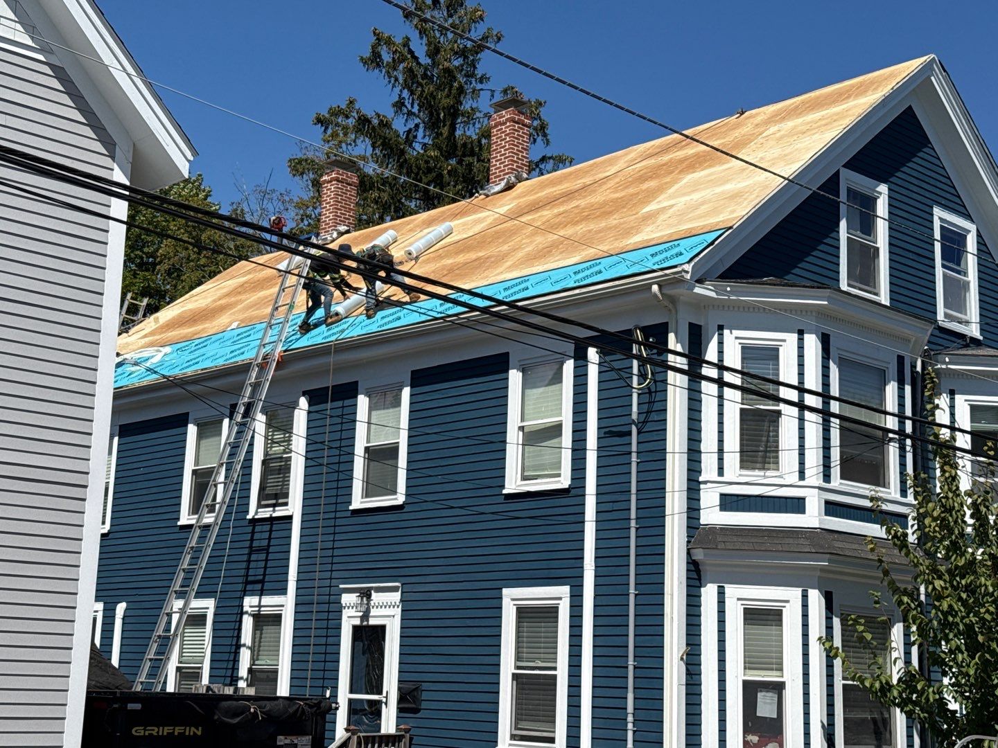 Half Roof Replacement for Solar Installation – Townhouse with New Plywood Decking by Sensible Home Solutions