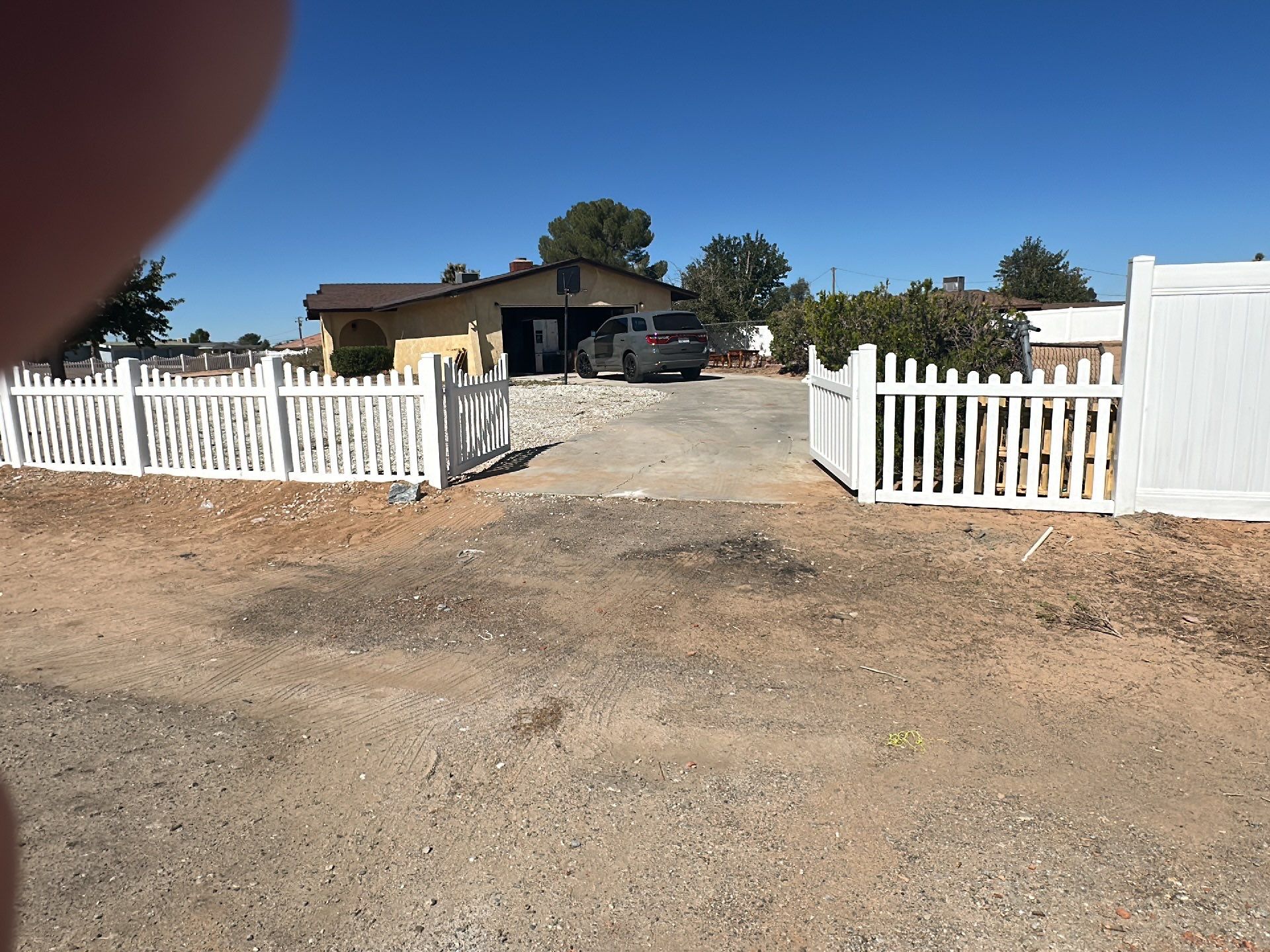 White picket fence  by Fence Guys Inc. 