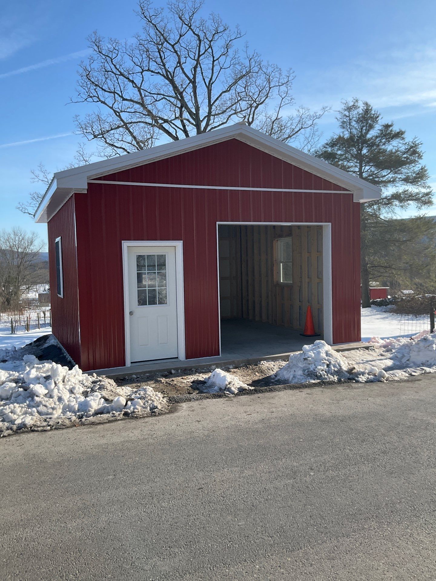 New Red Metal Garage Construction and Residential Window Replacement in Ashland by Esh Builders
