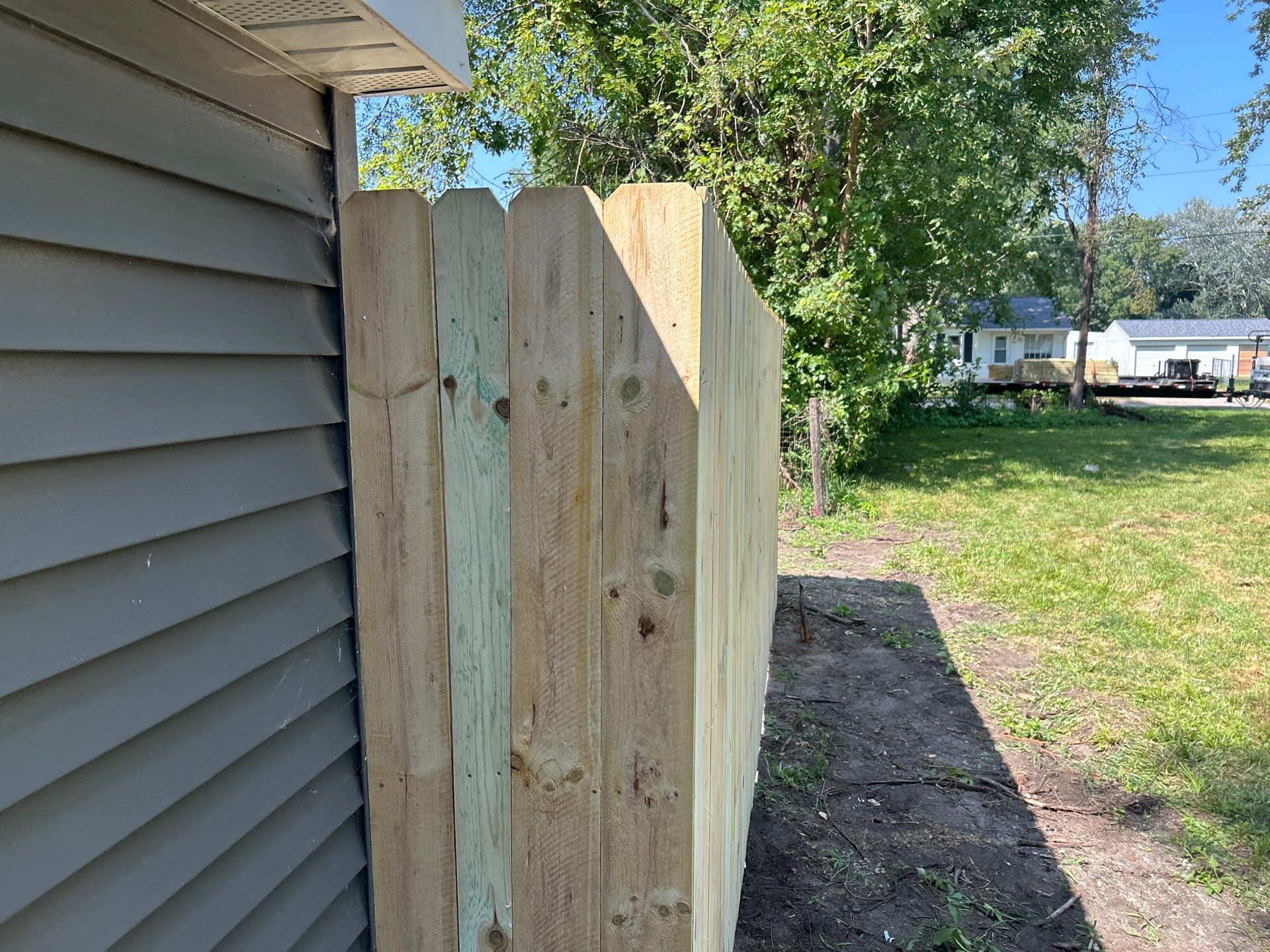 Treated Pine Privacy and Picket Fence Installation in Evansdale by Perfect Picket Fence and Stain