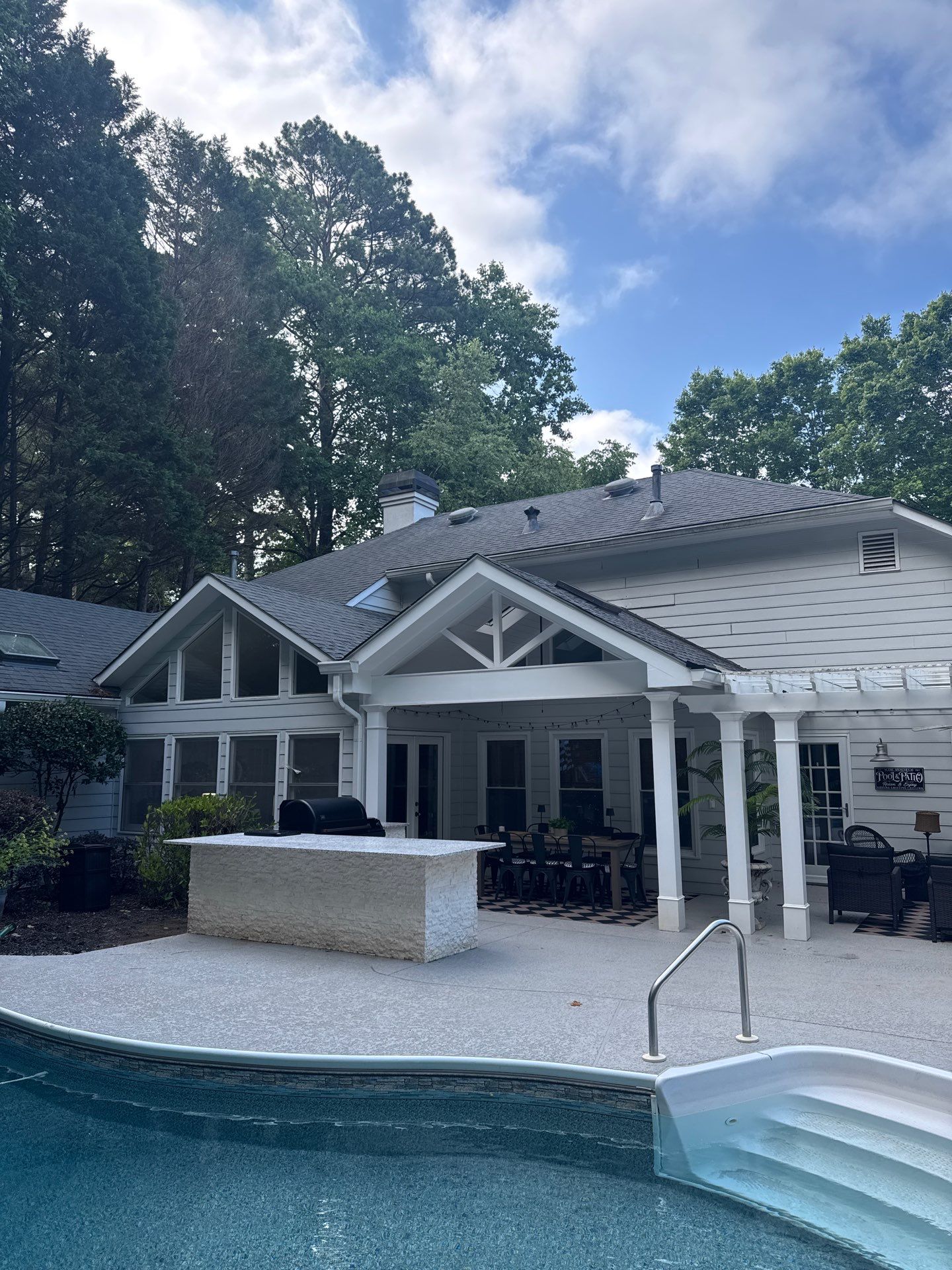 Marietta Poolside Pavilion with Custom Outdoor Kitchen and Pergola by Swift Home Renovations