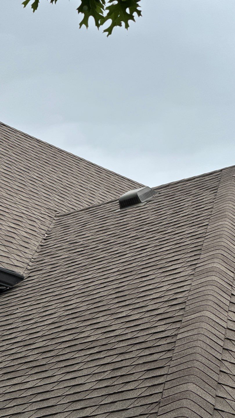 White brick with GAF Weathered Wood by Tejas Roofworks + Restoration