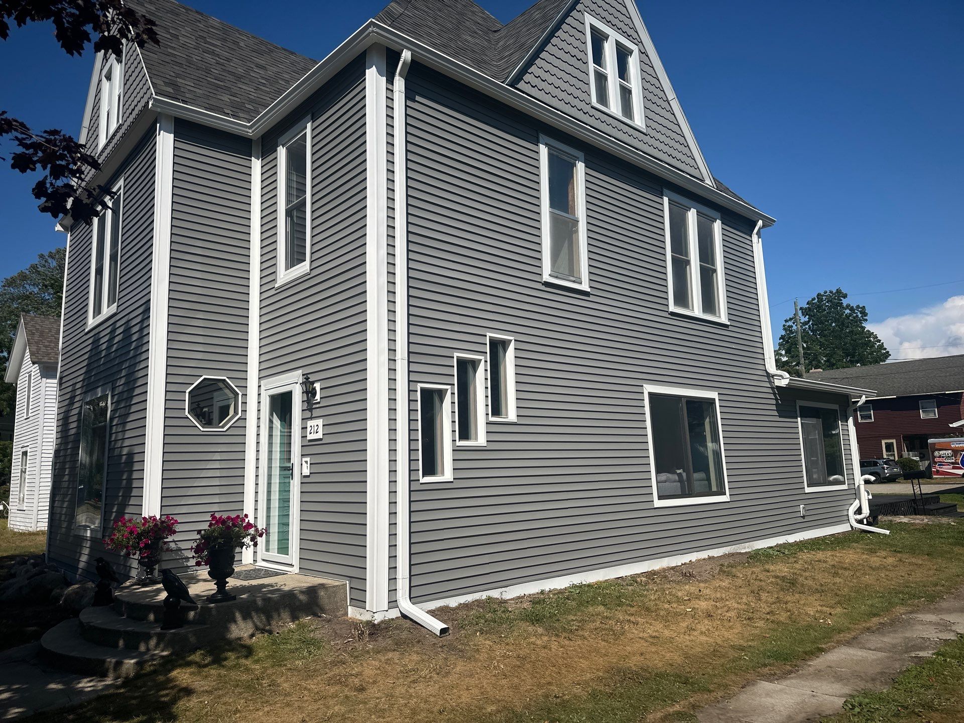 Complete Gutter and Downspout Installation in Charlevoix by Rainbow Seamless Systems