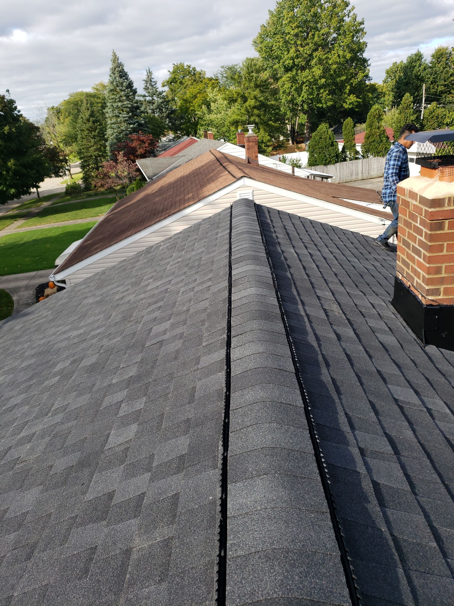 ATLAS PINNACLE COLOR: PRISTINE BLACK SHADOW DRIP EDGE: WHITE by Eagle Eye Roofing
