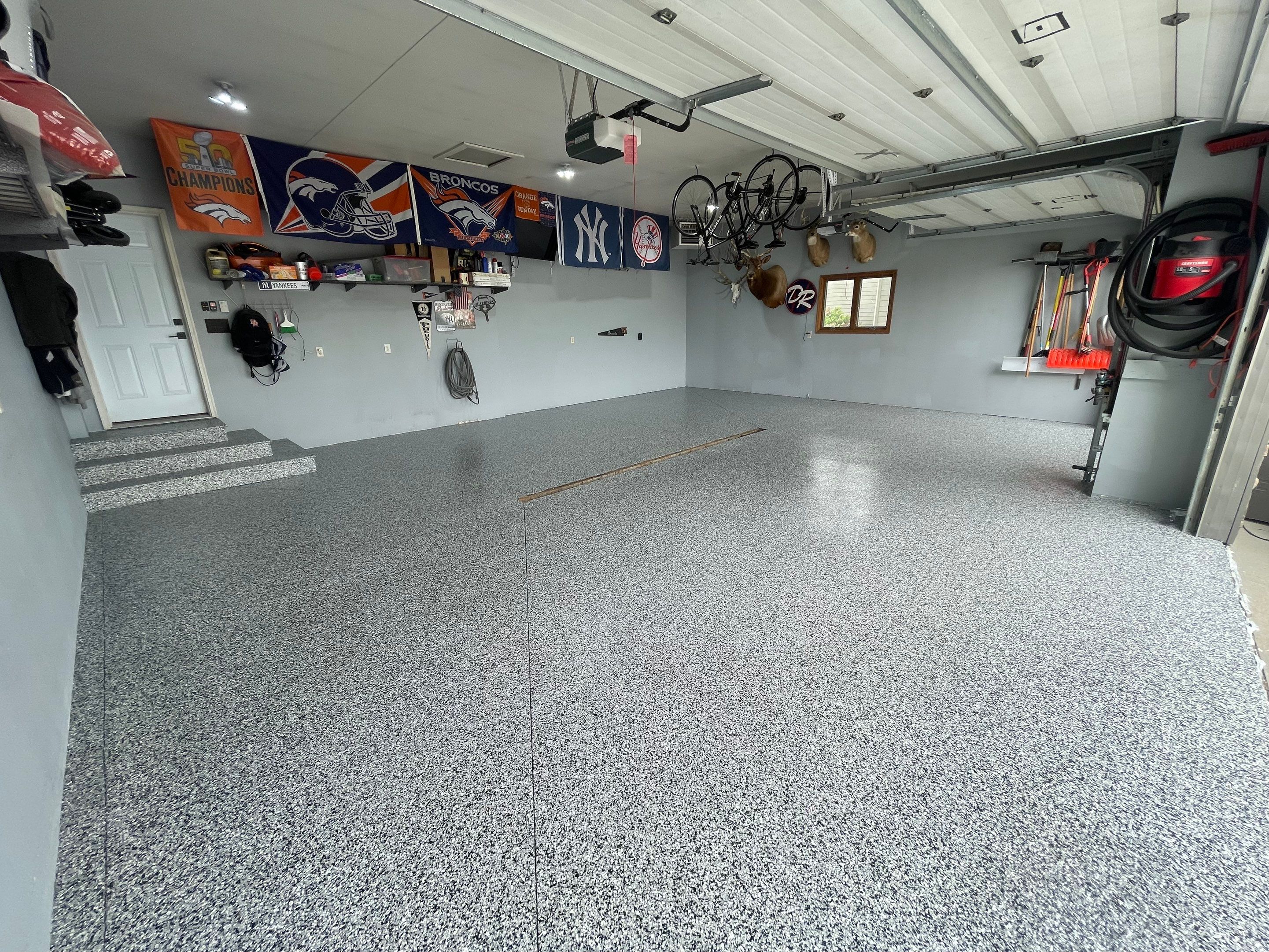 Full Garage Floor Epoxy Coating Installation in Dell Rapids by Select Painting, Coatings & Garage Cabinets