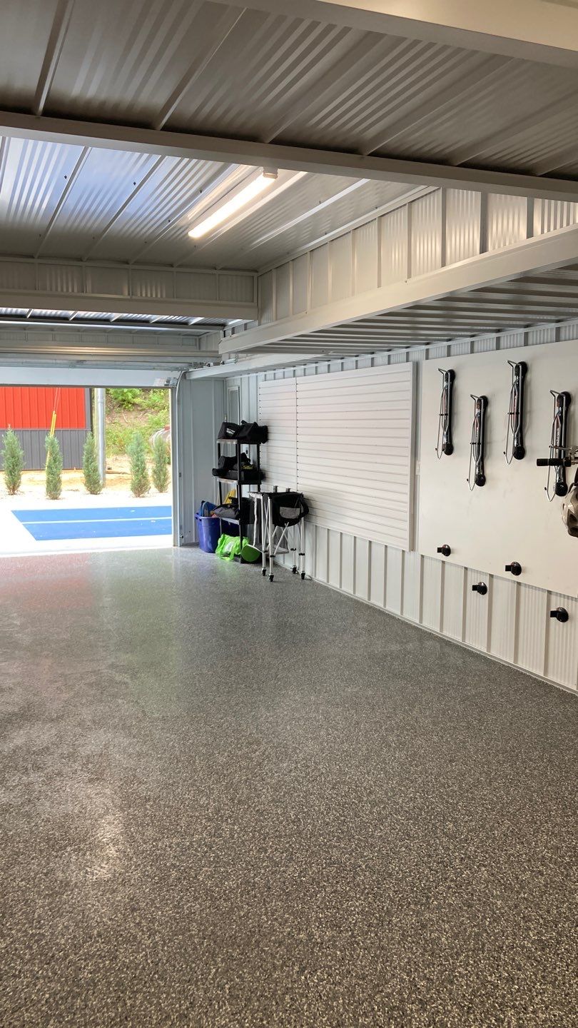 Exciting Garage Transformation in White Pigeon! by Innovative Spaces / Innovative Concrete Coatings