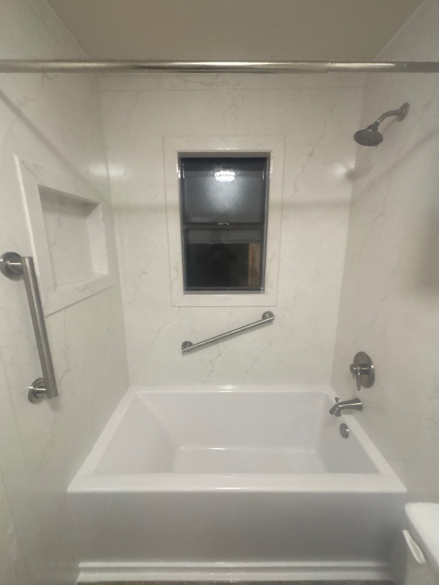 Tub- shower combo remodel in Kyle by Lane Lauritsen - The Hill Country, Texas