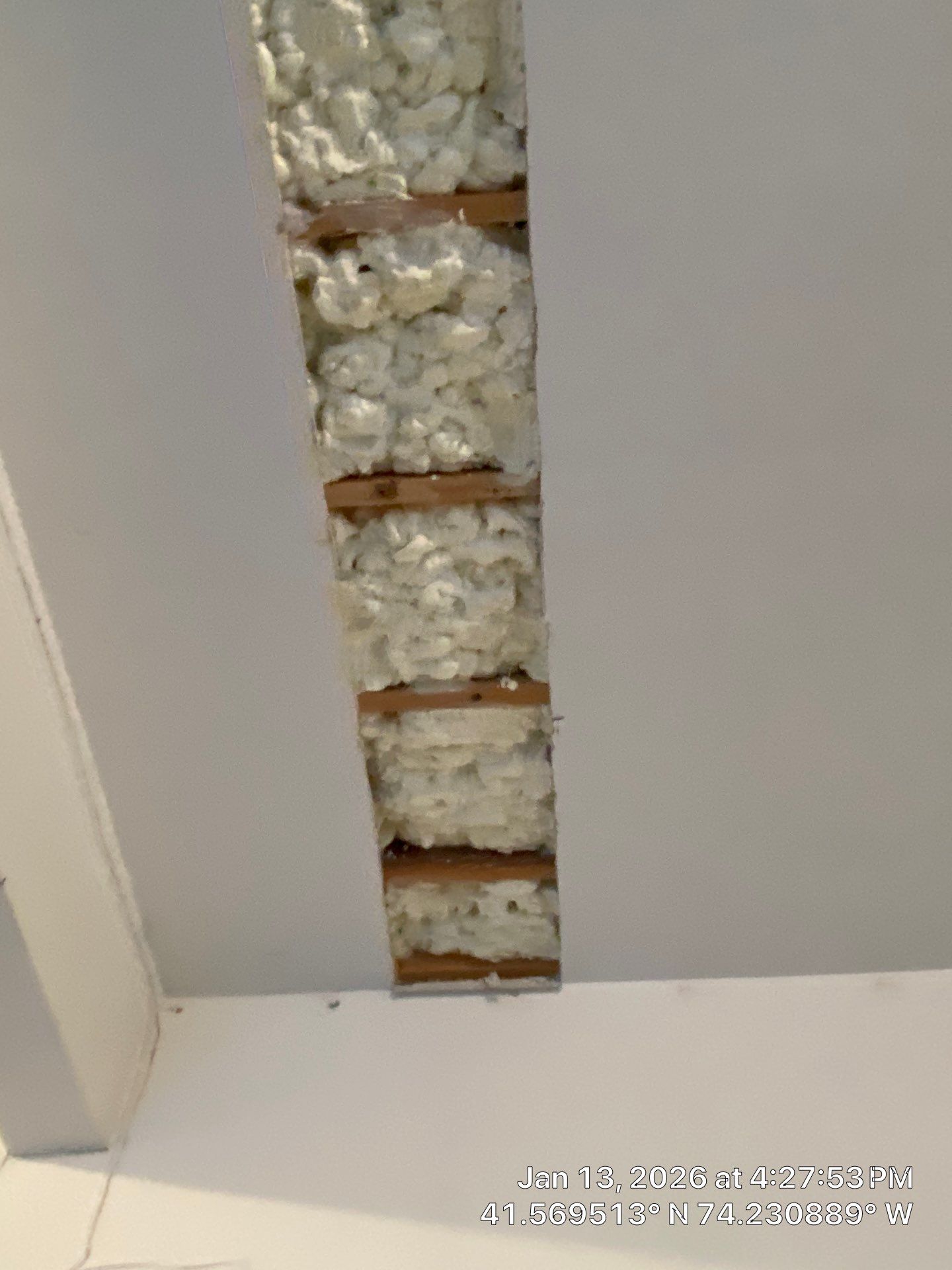 Garage ceiling using open cell spray foam by NYS Foam & Energy