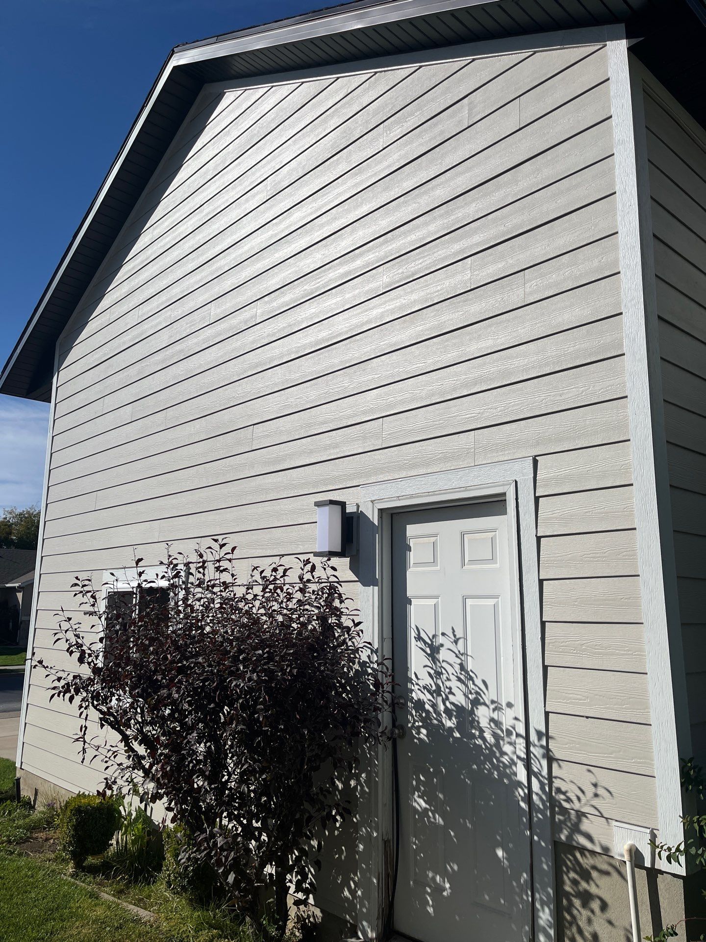Farmington | Stucco/Vinyl Demo & Hardie Conversion | Cobble Stone & Black by Ideal Siding Utah