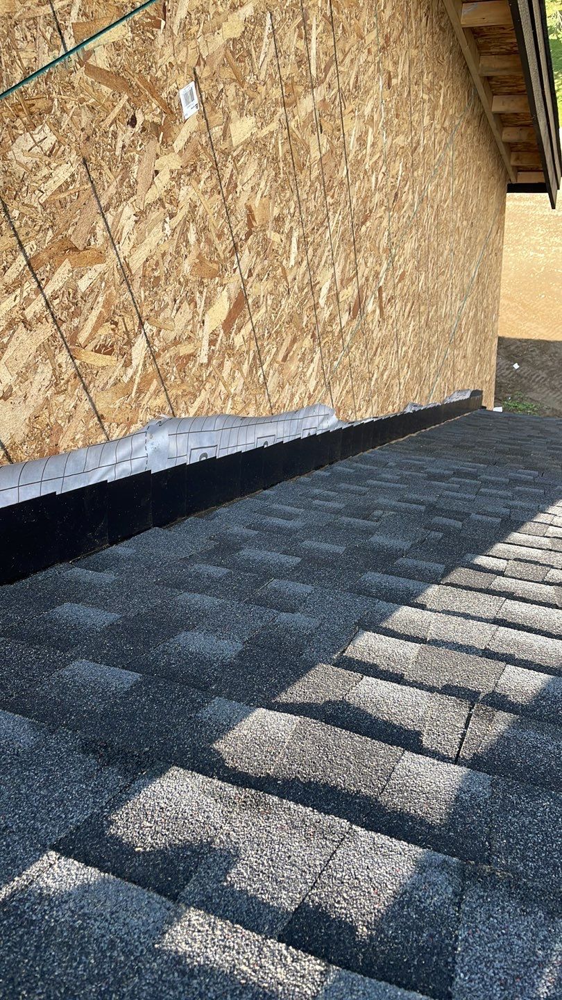 Residential Roofing Installation using GAF Charcoal HDZ by Top Notch Roofing Inc