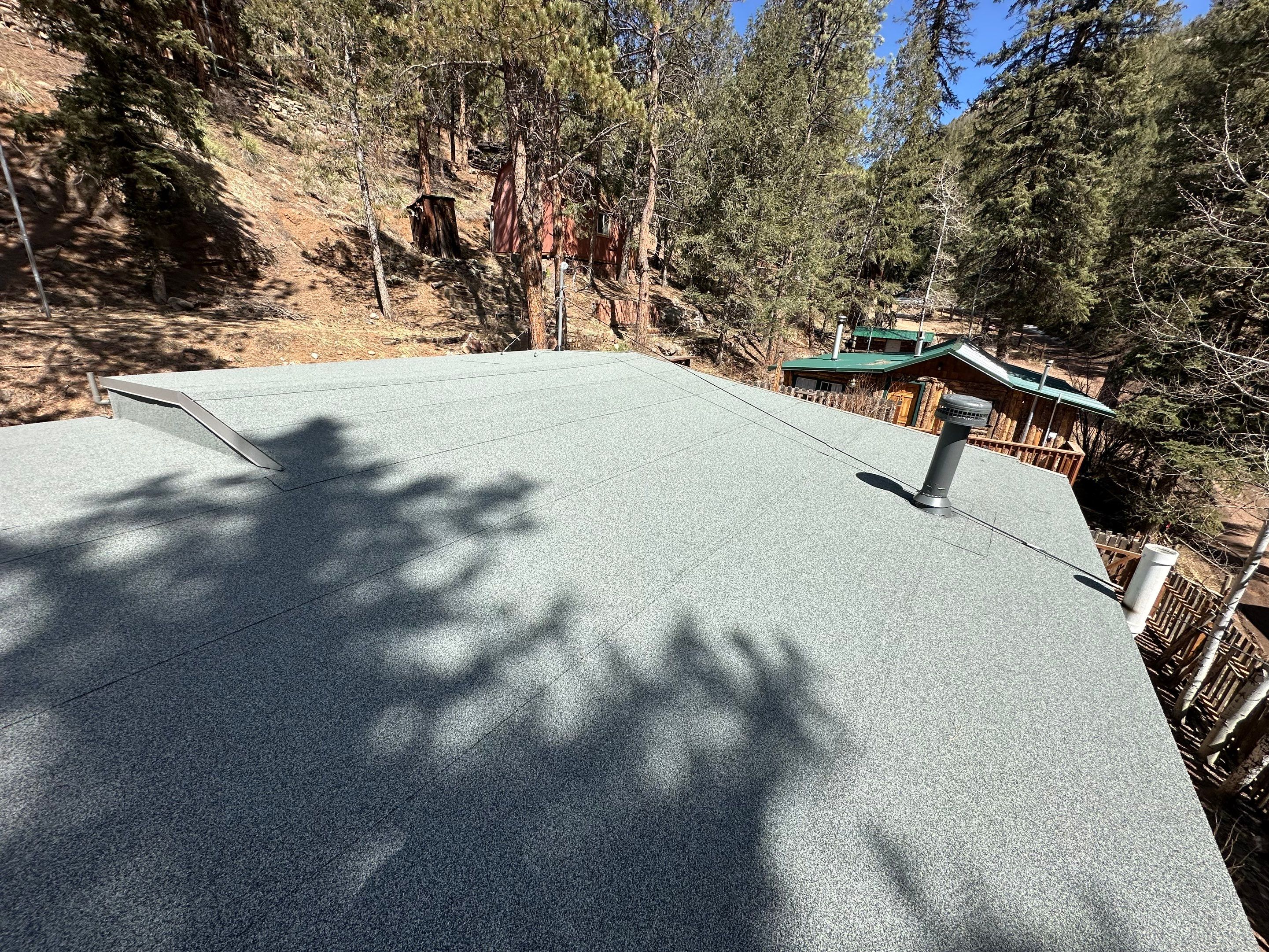 Residential Roofing Installation using Modified Bitumen Roofing by Blue Peaks Roofing LLC 
