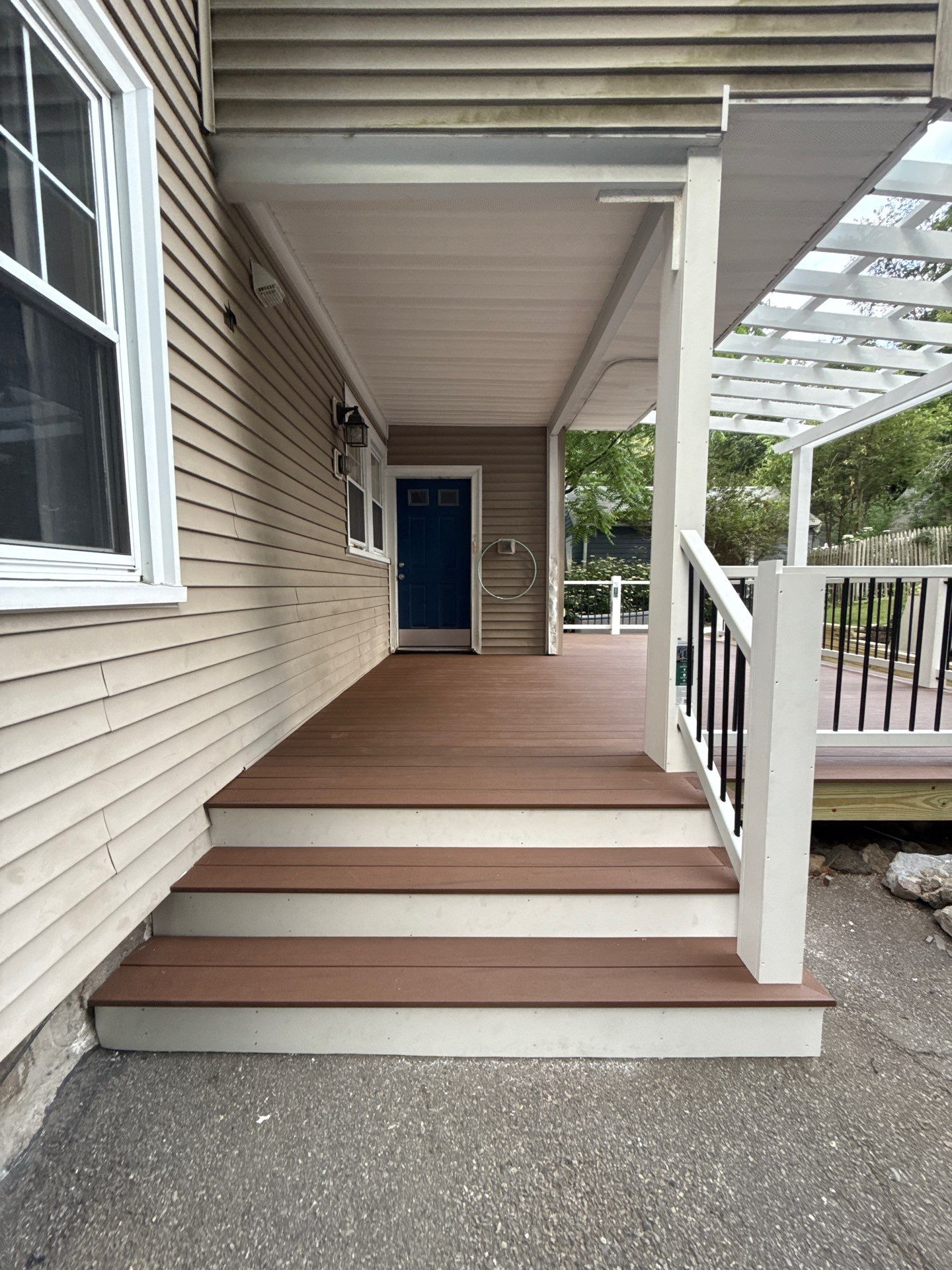 new deck with custom pergola by CabralCarpentry & Painting LLC