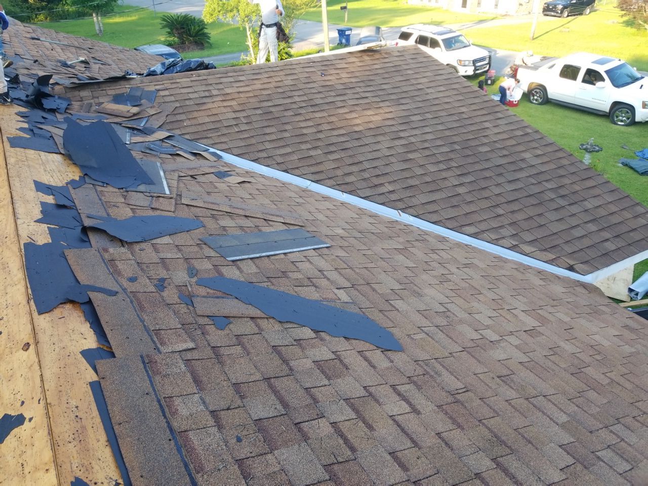 Residential Roofing Installation using Roof Replacement by American Roofing & Construction LLC