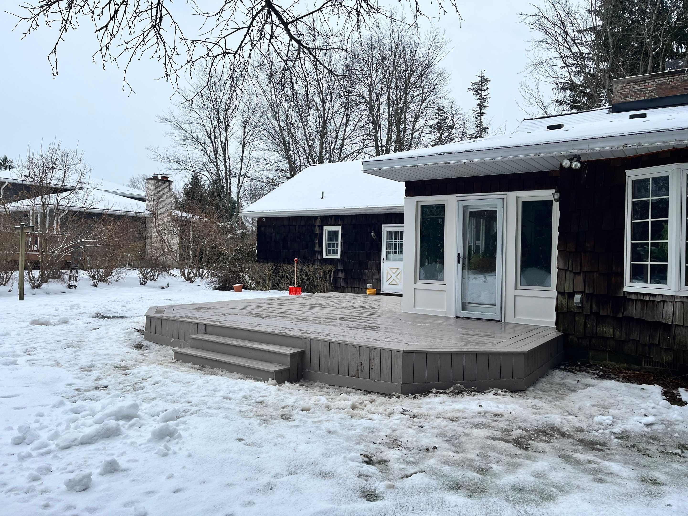 Deck and Stamped Concrete by Ivy Lea Construction