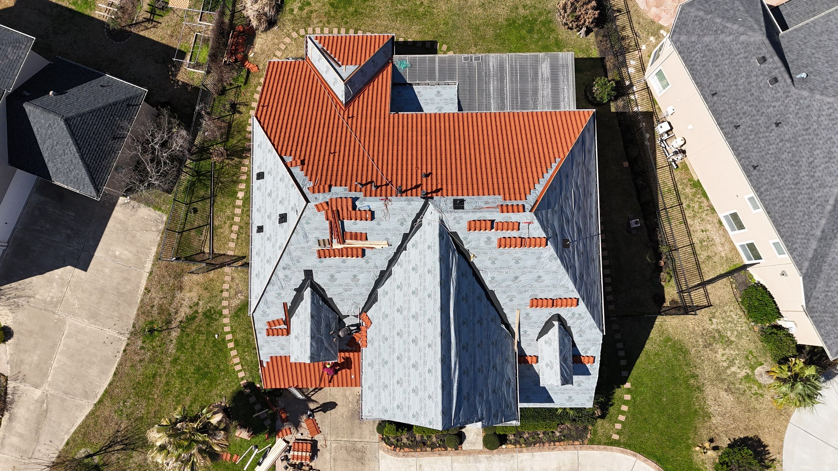 Stunning transformation using DECRA Villa Tile!  by Core Four Roofing