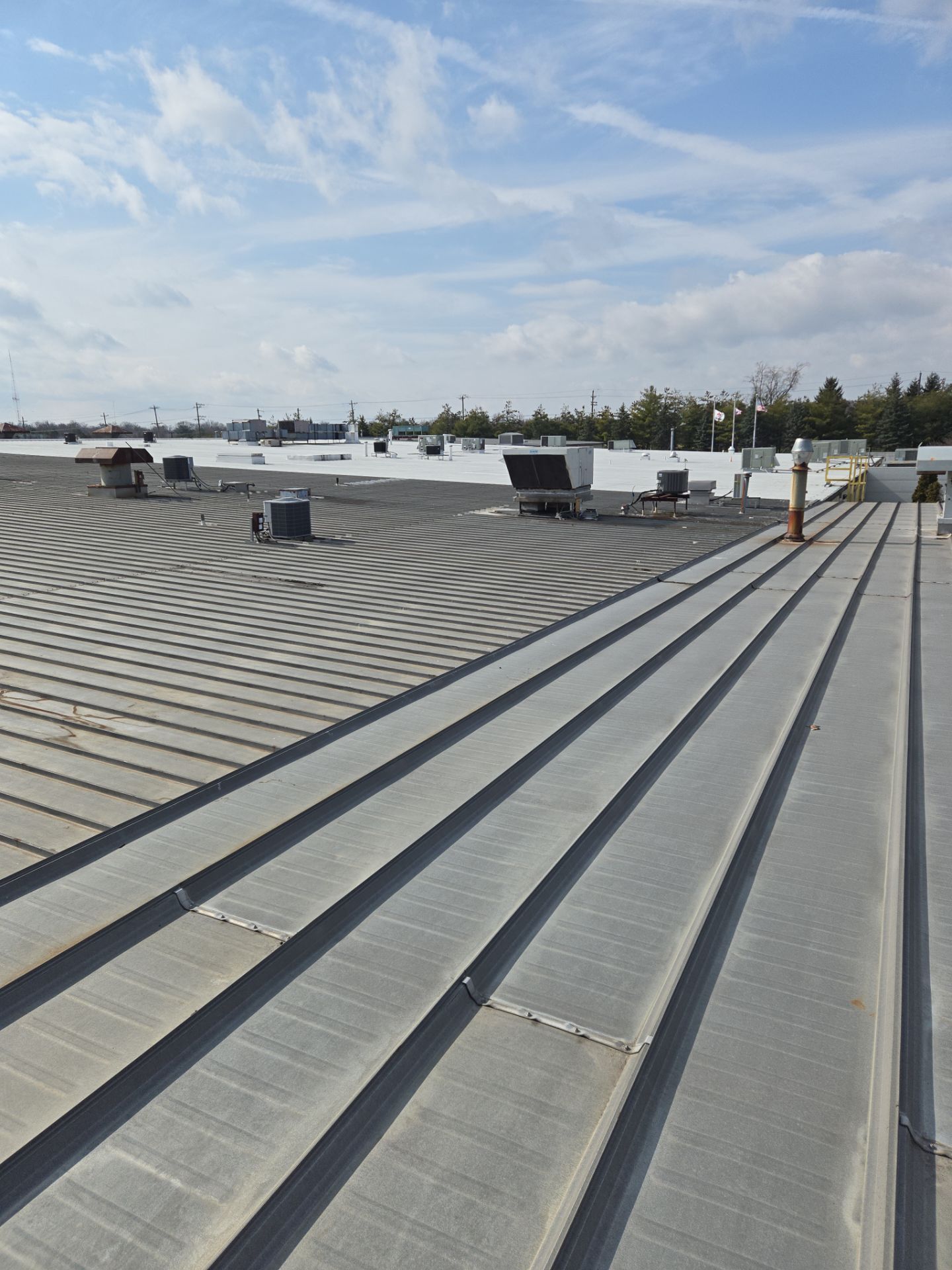 Commercial Metal and Flat Roof Repairs in Mason, Ohio by Level Up Roofing and Restoration Services LLC