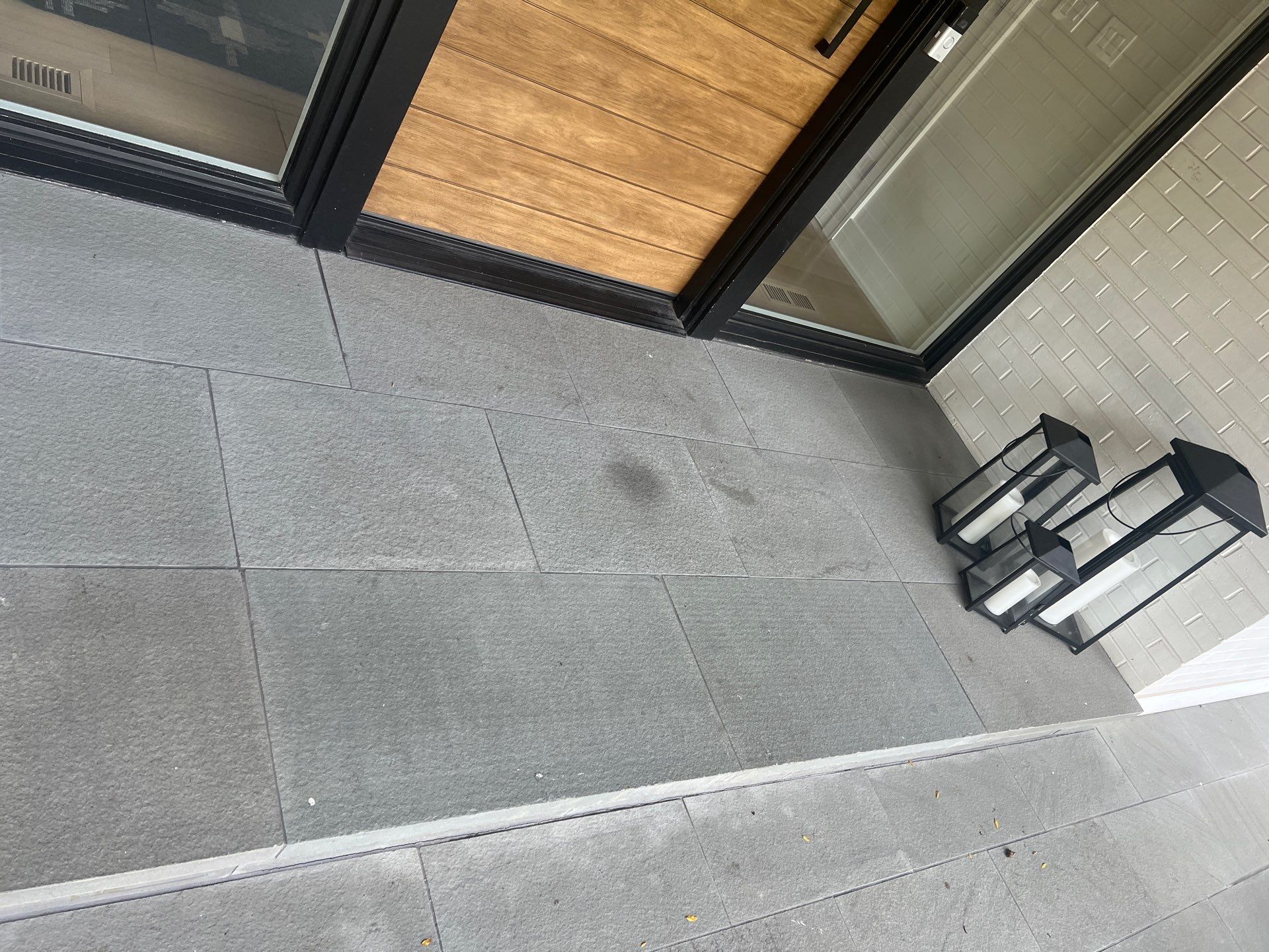 Complete Exterior House, Bluestone & Garage Floor Cleaning by Northern Power Washing LLC.