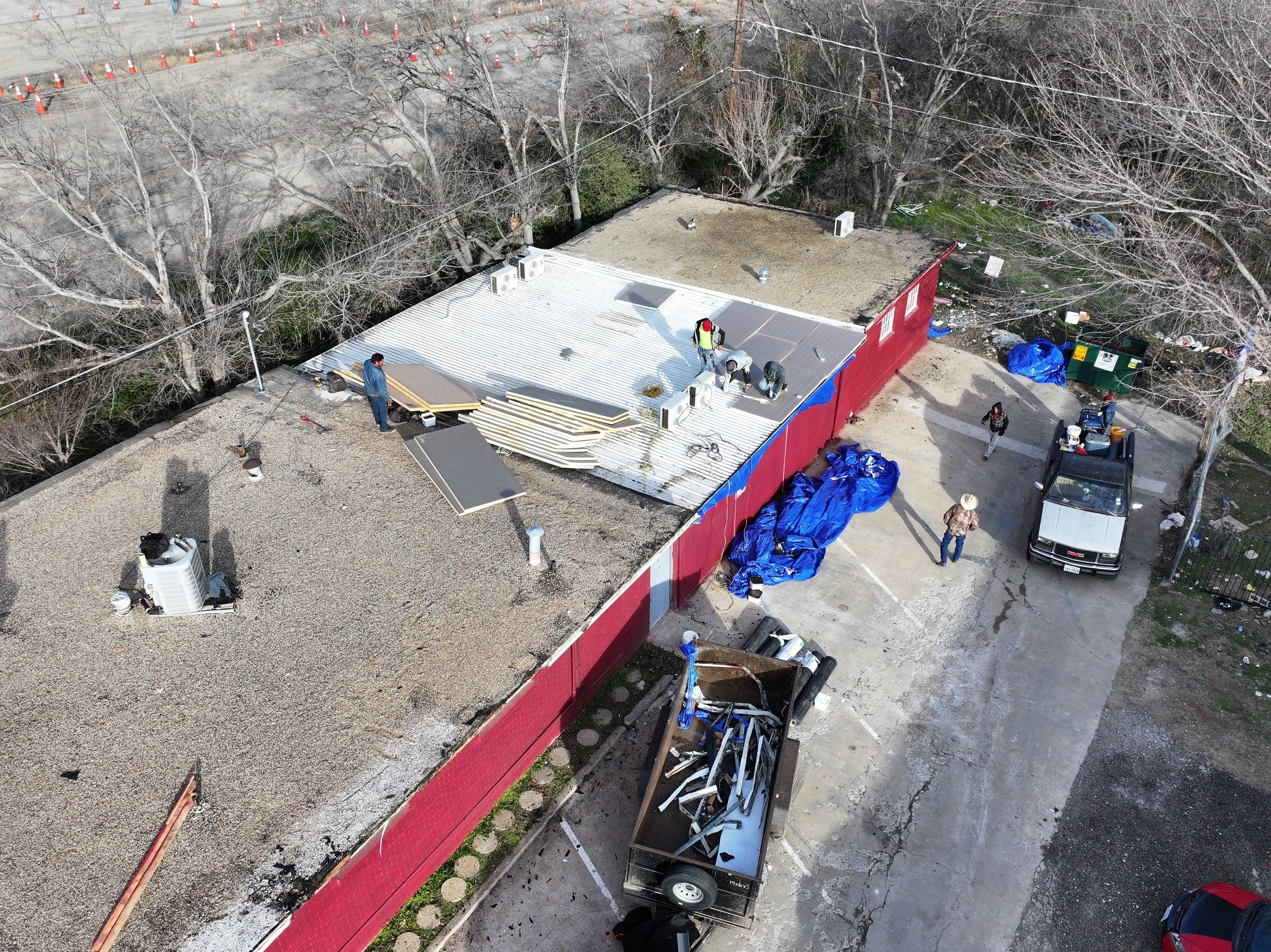 Commercial roofing overlay using GAF TPO over an old ballast roof by Becker Roofing and Exteriors