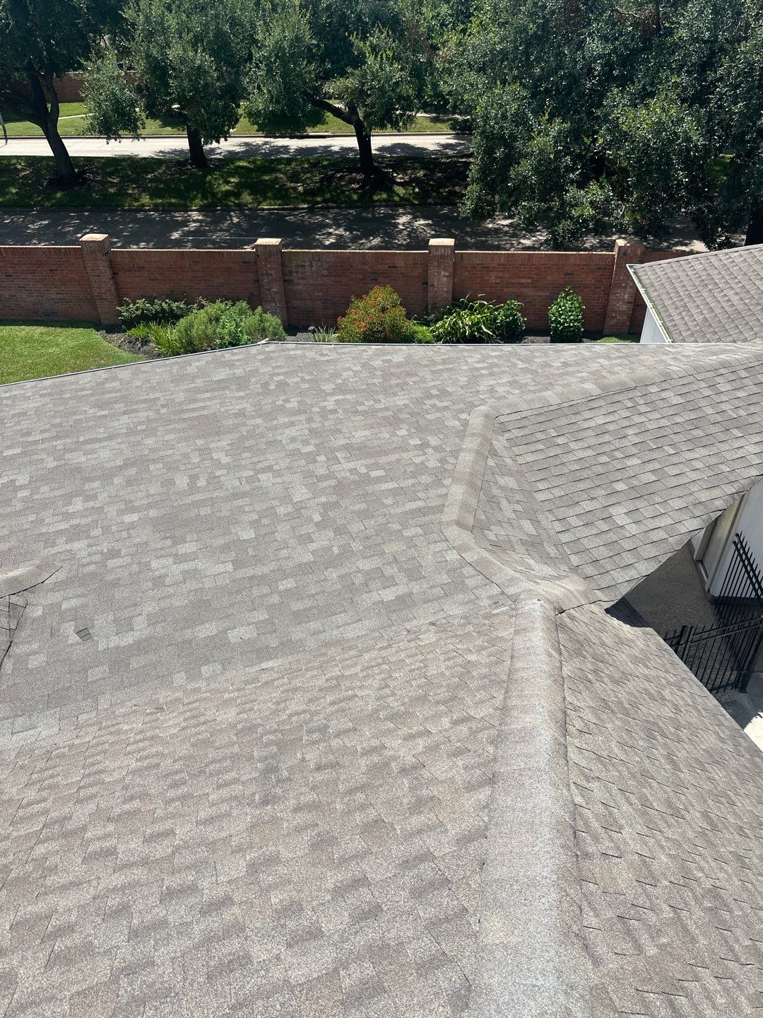 Hail Damage using Owen's Corning Duration (Lifetime) Shingles by Roof Repair Company