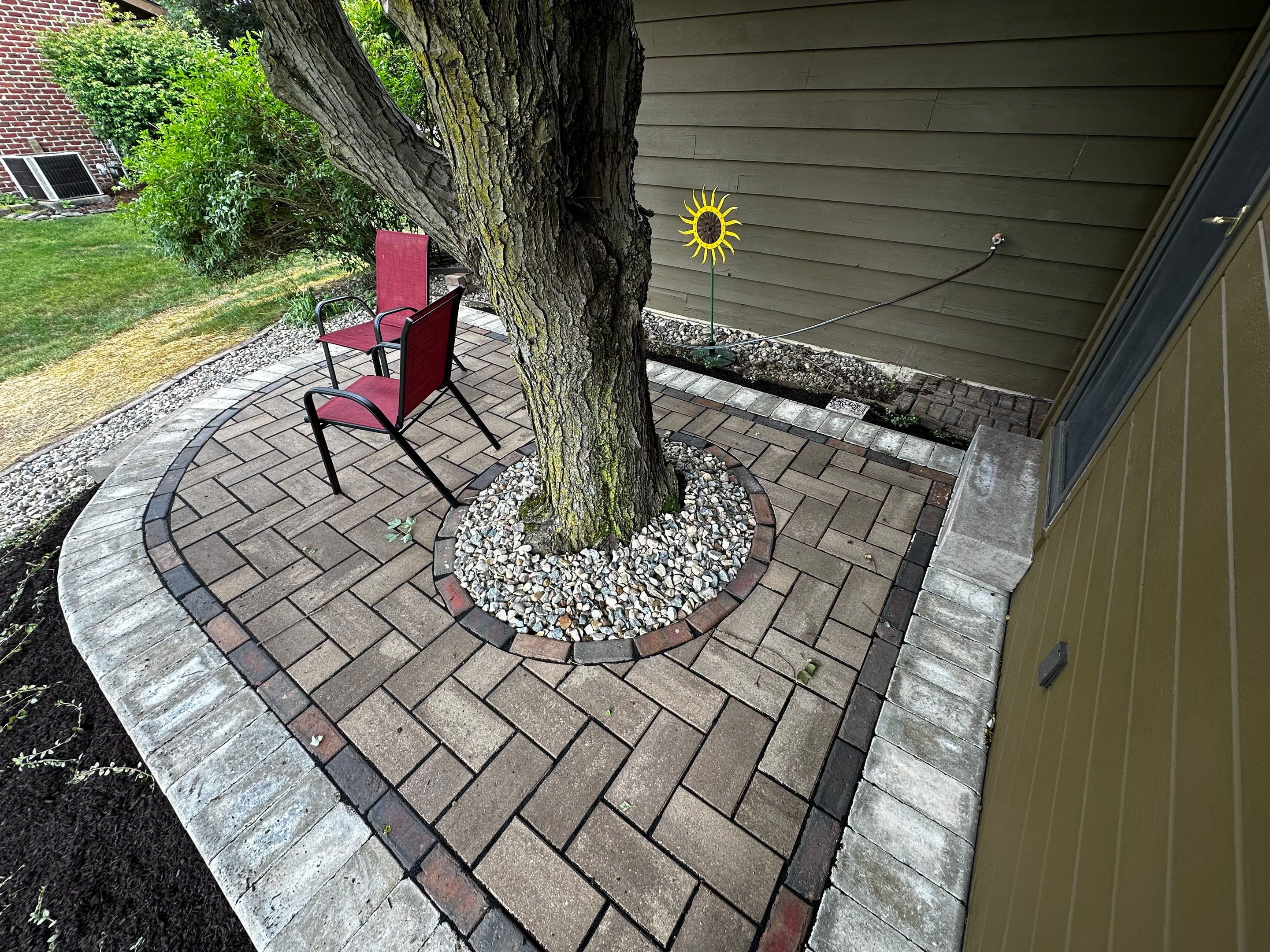 Simple Patio around Tree by Farrell's Lawn & Garden Center LLC
